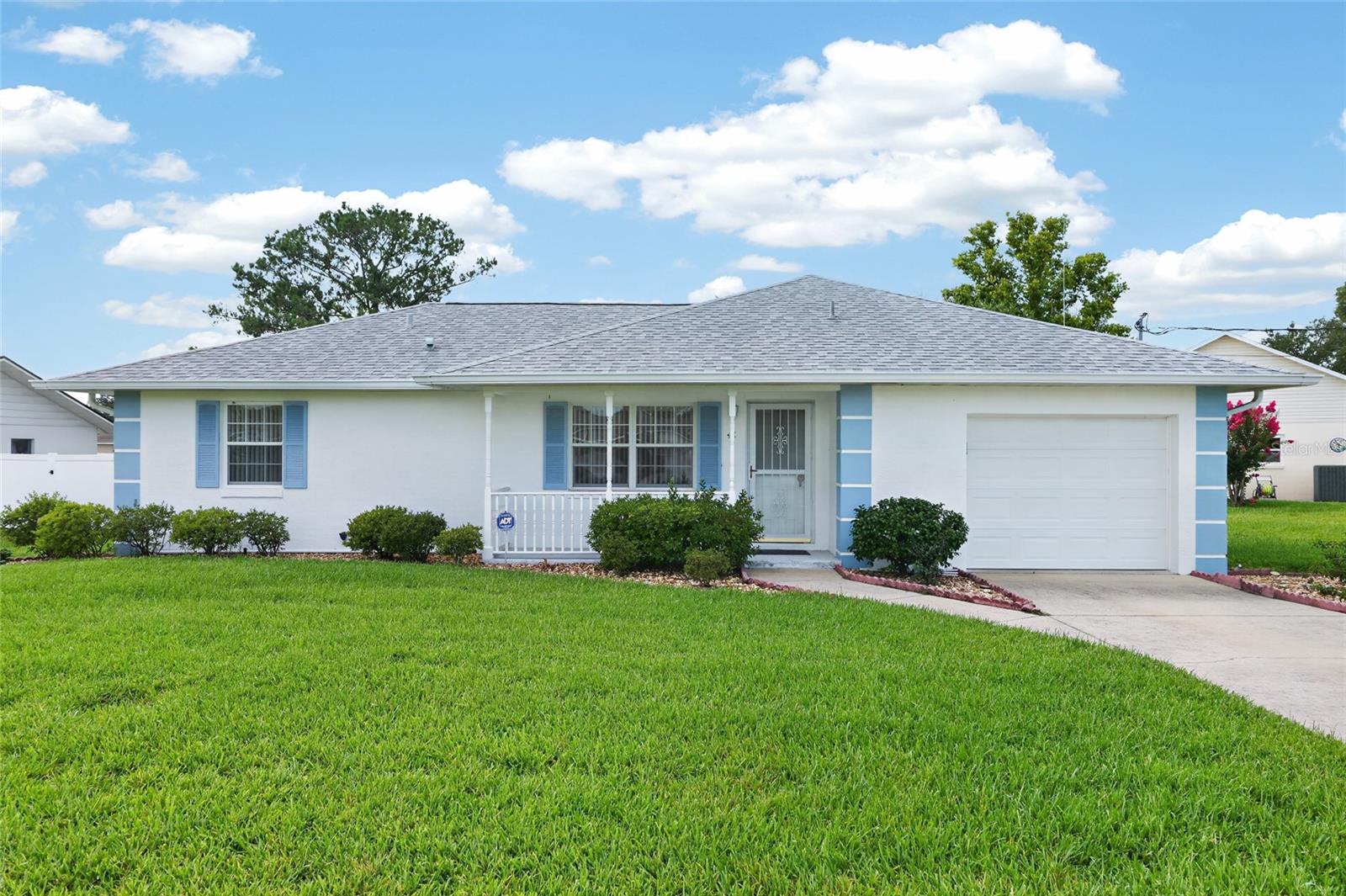 Charming 3 bed, 2 bath MOVE IN READY home with 1152 sf in Porter Shores!  Perfect as a starter home, down-sizing home or investment property!  NEW AC 2026. NEWER ROOF 2019. Located on a cul de sac in a quiet neighborhood, this WELL MAINTAINED home with a split floor plan is sure to please.  Enjoy your morning coffee on the 11x15 screened porch overlooking the large back yard with no rear neighbors.  All three bedrooms have walk in closets and ceiling fans.  Washer and Dryer are included.  Irrigation system.  Great location - approximately 1.5 miles to Florida Greenway State Park, 3 miles to Silver Springs State Park, 3 miles to Publix, and 4 miles to Walmart - also close to dining, medical and more!  Don't miss out - call for a private showing today!