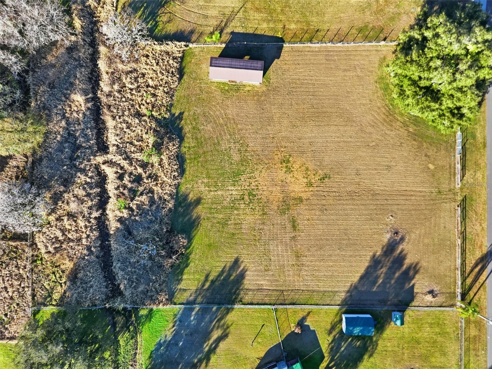 - Motivated Seller - Imagine waking up each morning on nearly 1.5 acres of pristine, cleared land—sunlight pouring across your private 200-foot frontage, with endless possibilities laid out in front of you. Welcome to 7005 Cripple Creek Road, a rare, wide-open canvas for the life you’ve always envisioned. Whether you're dreaming of a custom-built retreat, a modern farmhouse, or even an equestrian haven, this property brings that dream within reach.
Set on a sweeping 1.48-acre lot and already cleared, this is not just land—this is a lifestyle move. The lot has been thoughtfully prepared so you can dive right into making your vision a reality. Picture the driveway cutting through a clean, paved street that opens into your own personal oasis. Imagine horses grazing by the barn, entertaining guests under a canopy of stars, or cultivating a home that’s a true reflection of your design aesthetic—modern, rustic, bold, or serene.
There's a barn already on-site, complete with equipment space and other flexible-use areas, providing instant function while you plan or build. Horse lovers, take note: this property is AS-1 zoned and poised to accommodate all the paddocks, stables, and amenities you've ever wanted. With the quiet beauty of Cripple Creek Road as your backdrop and a paved access road that makes coming and going a breeze, you're getting rural tranquility without the hassle of “roughing it.”
Utilities? You’re covered. The lot is primed for well and septic installation, giving you full autonomy over your infrastructure while keeping things simple and cost-effective. The land itself sits high and dry in Flood Zone AE, so you can build with confidence and peace of mind. Every square foot of the 64,469 total provides an opportunity to create, expand, and thrive.
This isn’t just another piece of land—it’s the foundation for something remarkable. No HOA restrictions, no overbearing community guidelines—just freedom, flexibility, and the power to create a one-of-a-kind space that aligns with your goals. Whether you're building your forever home, a private ranch getaway, or an investment-grade property with future potential, this parcel delivers.
Opportunities like this don’t sit still. So bring your architect, your builder, your horses, or just your imagination. Because 7005 Cripple Creek Road isn’t just land—it’s your next big move.