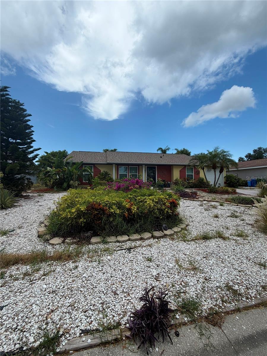 NO HOA NO CDD NO EXTRA FEES!! Welcome to this beautifully updated 2-bedroom, 2-bathroom home with a 1-car garage, ideally located in the heart of West Bradenton. Combining major system upgrades with timeless comfort, this residence offers peace of mind and an unbeatable location just minutes from Florida's world-famous Gulf Coast beaches.

Step inside to discover an inviting open-concept living area featuring vaulted ceilings, abundant natural light, and sliding glass doors leading to your own private screened lanai—the perfect place to enjoy your morning coffee or unwind in the evening. The spacious kitchen offers abundant cabinetry, an eat-in breakfast area, and a separate dining space ideal for entertaining family and friends.

Beautiful hardwood flooring flows throughout the living room, dining room, and bedrooms, while ceramic tile enhances the kitchen and bathrooms. This meticulously maintained home has been thoughtfully upgraded with complete re-piping and re-wiring, ALL brand new windows, a 2-year-old roof, 6-month-old A/C system, 2-year-old water heater, 1-year-old washer, fresh interior paint, upgraded kitchen, like-new ceiling fans, updated smoke detectors, and a freshly painted garage floor. Outside, you'll find a fully fenced backyard with a 2-year-old privacy fence and an 8' x 10' storage shed with high ceilings—perfect for tools, hobbies, or additional storage.

Location is everything, and this home delivers! Enjoy the convenience of being approximately:

0.5 miles to G.T. BRAY PARK: A quick 2- to 3-minute drive via 34th Ave W and 59th St W to access this massive community.
0.5 miles to the Bradenton YMCA.
A 10 minutes ride to the world renowned IMG SPORTS ACADEMY 
5 miles to ANNA MARIA ISLAND and BRADENTON BEACH
About a 15- to 18-minute drive west over the Cortez Bridge (State Route 684) or Manatee Ave (SR 64).
6 miles to ROBINSON PRESERVE: Roughly an 11-minute drive northwest via 75th St W to explore this scenic coastal haven.
7 miles to BRADENTON RIVERWALK & DOWNTOWN: About a 15- to 20-minute drive eastward along Manatee Ave W to hit the vibrant downtown and the Village of the Arts and famous BRADENTO FRESH MARKET
14 minutes to international restaurants, fine dinning, shopping, museums and historic scenery.

Whether you're looking for a primary residence, seasonal retreat, or investment opportunity, this exceptional home offers the perfect combination of quality updates, comfort, and an outstanding West Bradenton location.

Schedule your private showing today and experience everything this beautiful home includes!
