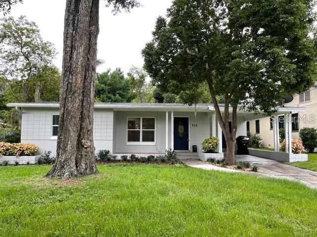 Light and bright 3-bedroom / 1-bathroom single story home in very desirable Delaney Park area.  Remodeled beauty boasts shaker style cabinets in the kitchen with stainless steel appliances, wood floors, large room off back of home could be used as a family room or home office, inside utility room, remodeled bathroom and spacious bedrooms.  A rated schools and in close proximity to Orlando Health, SODO shops, downtown Orlando and 2 parks in walking distance.  Home also has fenced backyard with back patio with brick pavers.  Call for a showing appointment today!!