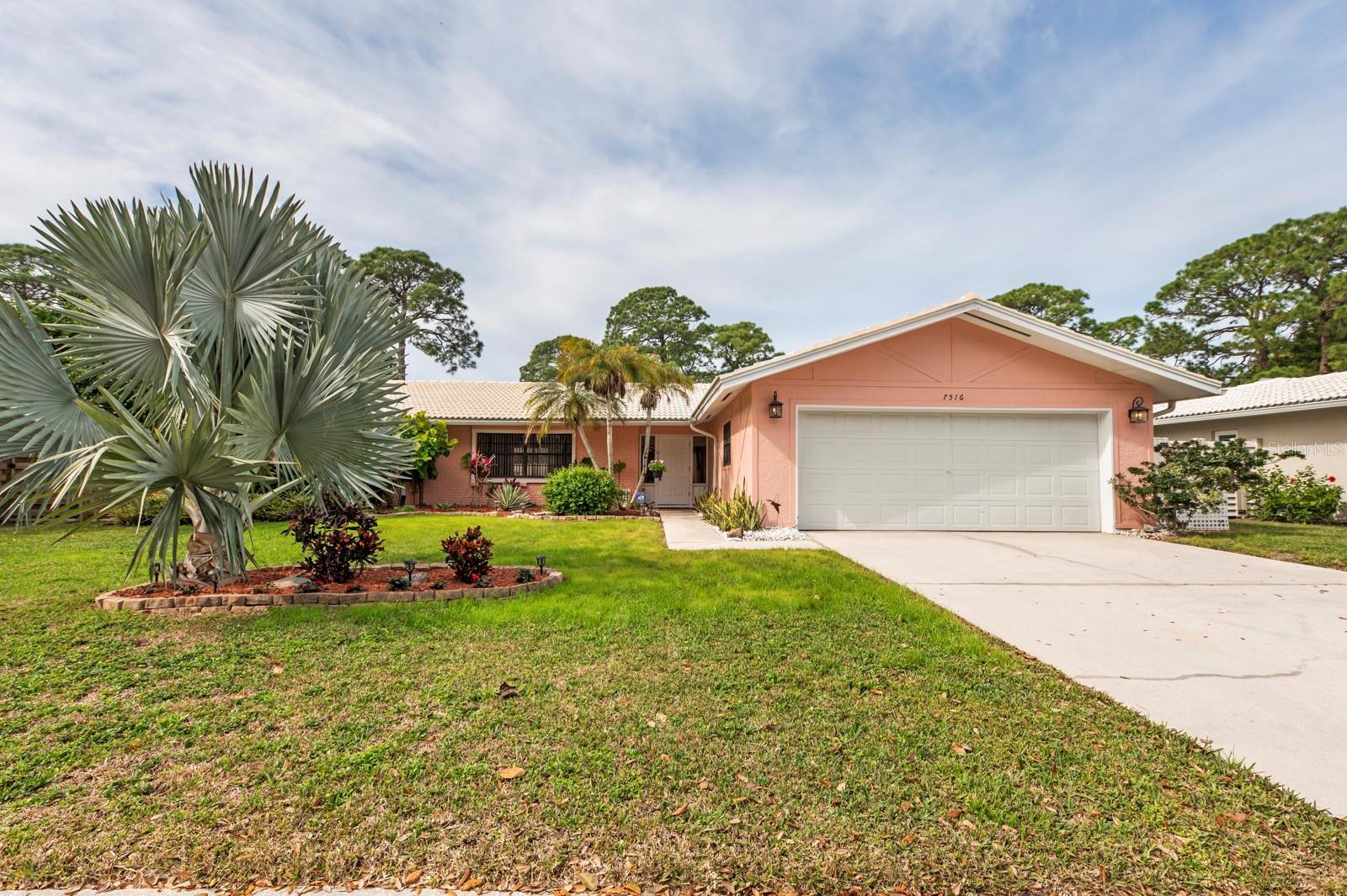One or more photo(s) has been virtually staged. Welcome to your dream home just a stone's throw away from SIESTA KEY at 7516 Mariana Drive! This gem in Gulf Gate Woods boasts a newly resurfaced gunite pool, perfect for those sunny Florida days. With 3 bedrooms and 2 baths spread across 1896 sq ft, this home is the definition of modern luxury.

Step into the newly renovated kitchen with quartz countertops, porcelain tile floors, and soft-close cabinets - a chef's paradise! The ceramic-tiled bathrooms feature quartz vanity tops and fresh paint throughout adds a touch of elegance.

The master bedroom ensuite offers privacy with spare bedrooms on the opposite end. Enjoy cozy nights in the bonus TV room or entertain guests in the large patio within the screened enclosure overlooking the lush fenced backyard.

Glass sliding doors seamlessly connect indoor and outdoor spaces while the laundry room and ample storage space make organization a breeze. The 2-car deep garage provides convenience, alongside a utility/pool supply room where all plumbing has been updated for peace of mind.

With hurricane window panels and a roof sealed with a 5-year transferable warranty, you can enjoy coastal living worry-free. Don't miss out on owning this exquisite property with its prime location and abundance of amenities. Experience luxury living at its finest - schedule your private tour today!