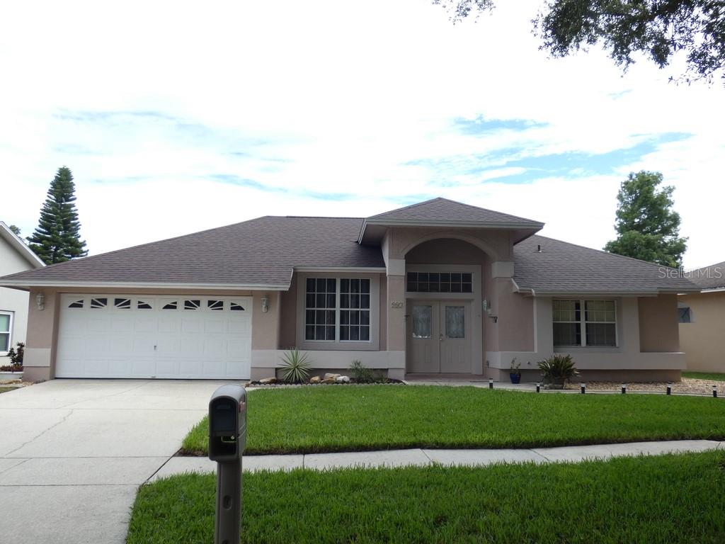 This 4-Bedroom, 2-Bath Block Pool Home Offers 2,091 Square Feet of Living Space. Built in 1990, the Home Features a Two-Car Garage and a Private Screened Swimming Pool. The Home Features Cathedral Ceilings, Formal Living and Dining Rooms, and a Spacious Family Room That Opens to the Kitchen. The Kitchen Includes a Coffee Bar, While the Primary Suite Offers a Walk-In Closet and Direct Access to the Pool Area. Multiple Sliding Glass Doors Provide Plenty of Access for Everyday Fun, Creating Seamless Indoor-Outdoor Living. The Fenced Backyard Includes Artificial Turf, a Recently Updated Birdcage Screen Enclosure, and a Cool-Coated Pool Deck. Recent Improvements Include a New Roof Installed in 2026, Exterior Painting, a Resurfaced Pool, and New Outdoor Ceiling Fans. The Home Has Been Maintained Quite Well.
The Home Is Located in the Brittany Park Community, Has an HOA Fee of $240 Per Year and No CDD Fees. The Neighborhood Is Deed Restricted and Is Conveniently Located Near the Historic Tarpon Springs Sponge Docks, Downtown Tarpon Springs, Gulf Beaches, Shopping, Restaurants, and Major Roadways.  Less Than 15 Miles to St. Pete Beach, Named the #1 Beach in America and the 5th Best Beach in the World. Please View Both Videos: Tour 1 and Tour 2.