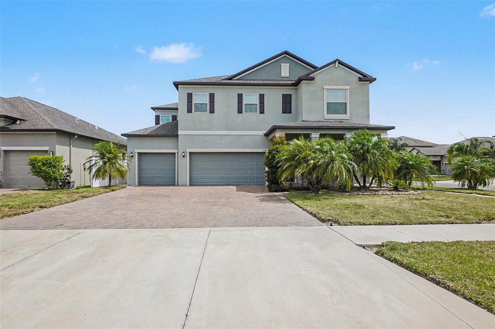 Virtually Staged. Spacious 5-Bedroom Home with Huge Potential in South Fork!  Discover this 2019 Lennar “Colorado” model, which offers nearly 3,000 sq ft, 5 bedrooms, 3 baths, and a rare 3-car garage (30’ x 23’). It features a first-floor bedroom and full bath, open-concept living with a large granite kitchen, and an upstairs layout that includes a massive primary suite with a garden tub, dual vanities, and an oversized walk-in closet. A generous loft and three additional bedrooms complete the second floor. Home is sold as-is and needs a little TLC—perfect for buyers or investors looking to build instant equity. Located in the desirable South Fork community with amenities including a pool, playground, basketball courts, and parks. It is minutes from shopping, dining, US-301, and I-75 for an easy commute.