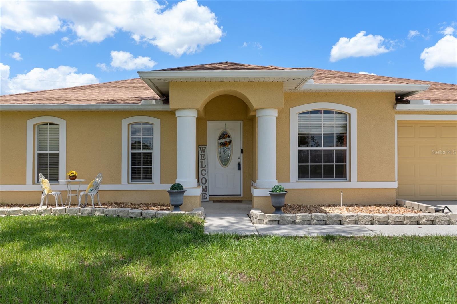 The Perfect Location for Today's Busy Lifestyle! If convenience is at the top of your wish list, you've found it. Perfectly positioned on the edge of Brooksville and Spring Hill, 15437 Deer Path places you just minutes from shopping, restaurants, medical facilities, Chocachatti Elementary School, Nature Coast Technical High School, Wilton Simpson Technical College, and only about five minutes from the Suncoast Parkway (589), providing an easy commute to Tampa in approximately 45 minutes or less. Lovingly maintained, this move-in-ready home offers peace of mind with a 2023 roof and a beautifully updated kitchen showcasing custom wood cabinetry, granite countertops, stainless steel appliances, and tile flooring. It's the perfect gathering place for everyday living and entertaining alike. Step inside and you'll immediately appreciate the soaring vaulted ceilings that create a bright, open feel throughout the main living areas. With wood laminate and tile flooring throughout, there's NO carpet to replace-making maintenance both easy and attractive. The desirable split-bedroom floor plan offers privacy for family and guests. The owner's suite features dual vanities, a spacious walk-in shower, and excellent lighting to make busy mornings easier. Two additional bedrooms with upgraded ceiling fans share a full guest bath with a tub/shower combination, with interior laundry. The outdoor living space is where this home truly shines. Relax year-round on the expansive 27' x 12' screened lanai, complete with plenty of room for outdoor dining, entertaining, or simply unwinding in your private hot tub. The picket fenced backyard with charming picket fencing offers space for pets, gardening, or play. Located on a quiet dead-end street with very little through traffic, this home delivers the perfect blend of comfort, convenience, and value. Whether you're buying your first home, downsizing, or simply looking for a home that keeps you close to everything you need, this one checks all the boxes.