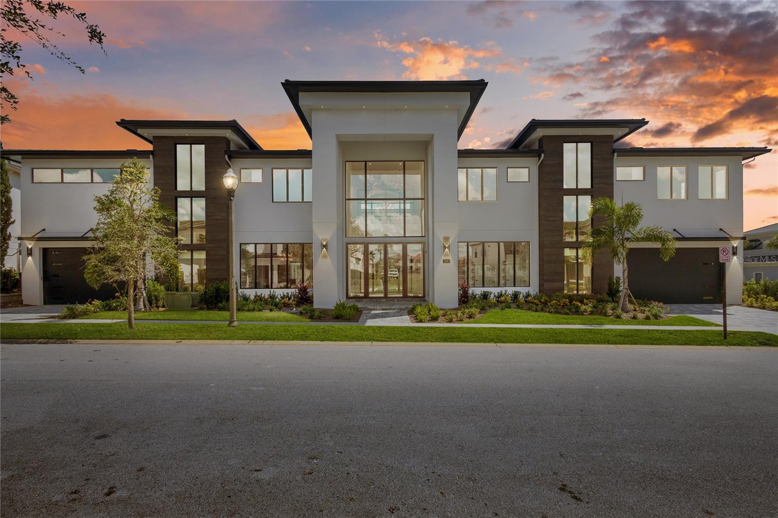One or more photo(s) has been virtually staged. Welcome to Reunion Resort, where dreams come to life! Just 10 minutes from Disney, this brand-new custom designed MEGA MANSION offers the ultimate Florida luxury lifestyle. It is not only a lavish retreat but also a fantastic turn-key investment opportunity for you and your family. Step into the epitome of luxury and custom design with this residence, showcasing 15,319 square feet of flawless indoor and outdoor living spaces. The estate showcases natural elements, premium finishes, a stunning resort-style pool and spa, featuring a meticulously crafted 46,000-gallon POOL spanning 1,800 square feet, designed by American Pools and Spas. The two-story, enclosed POOL AREA includes a SWIM-UP pool BAR and an expansive 4,000-square-feet Lanai Entertainment Area— one of the largest in Reunion! Perfect for extravagant gatherings, this space is equipped with a fully functional outdoor kitchen and versatile entertainment zones. Enjoy the serenity of an on-site fitness room and a rejuvenating sauna, creating the ultimate relaxation. The Lanai also offers a top-notch projector and screen for entertainment, sitting on a double lot of total 0.51 acre and East Facing Back Yard, all set against a backdrop of natural beauty provided by the conservation area view. This luxurious estate boasts a MASSIVE open floor plan and 12 EN-SUITE bedrooms and a total of 15 bathrooms, including THREE PRIMARY SUITES—one on the MAIN FLOOR and TWO on the upper level—ensuring ample space and privacy. TWO LAUNDRY ROOMS, each equipped with washer-dryer sets, are conveniently distributed across BOTH FLOORS. Designed for entertaining, the stunning kitchen features DUAL EXPANSIVE ISLANDS, two SUB ZERO fridges, and the large PANTRY. Culinary enthusiasts will appreciate the well-equipped scullery, complete with its own pantry and sleek QUARTZ countertops. The UPPER floor continues to impress with a SKY LOUNGE with a BAR, a generous LOFT, an inviting BALCONY, an additional GAME ROOM, and a GRAND THEATER with a 220-inch SCREEN and PROJECTOR. Double STAIRCASES and an ELEVATOR provide seamless access throughout the home, while seven HVAC units and four tankless water heaters ensure both comfort and efficiency. The resort features three PGA Golf Courses designed by Jack Nicklaus, Arnold Palmer, and Tom Watson, as well as a water park and tennis facilities. Schedule your private viewing today and discover your next investment home! **REUNION RESORT TRANSFERRABLE ACTIVE MEMBERSHIPS that will give you full access to Reunion Resort amenities.**