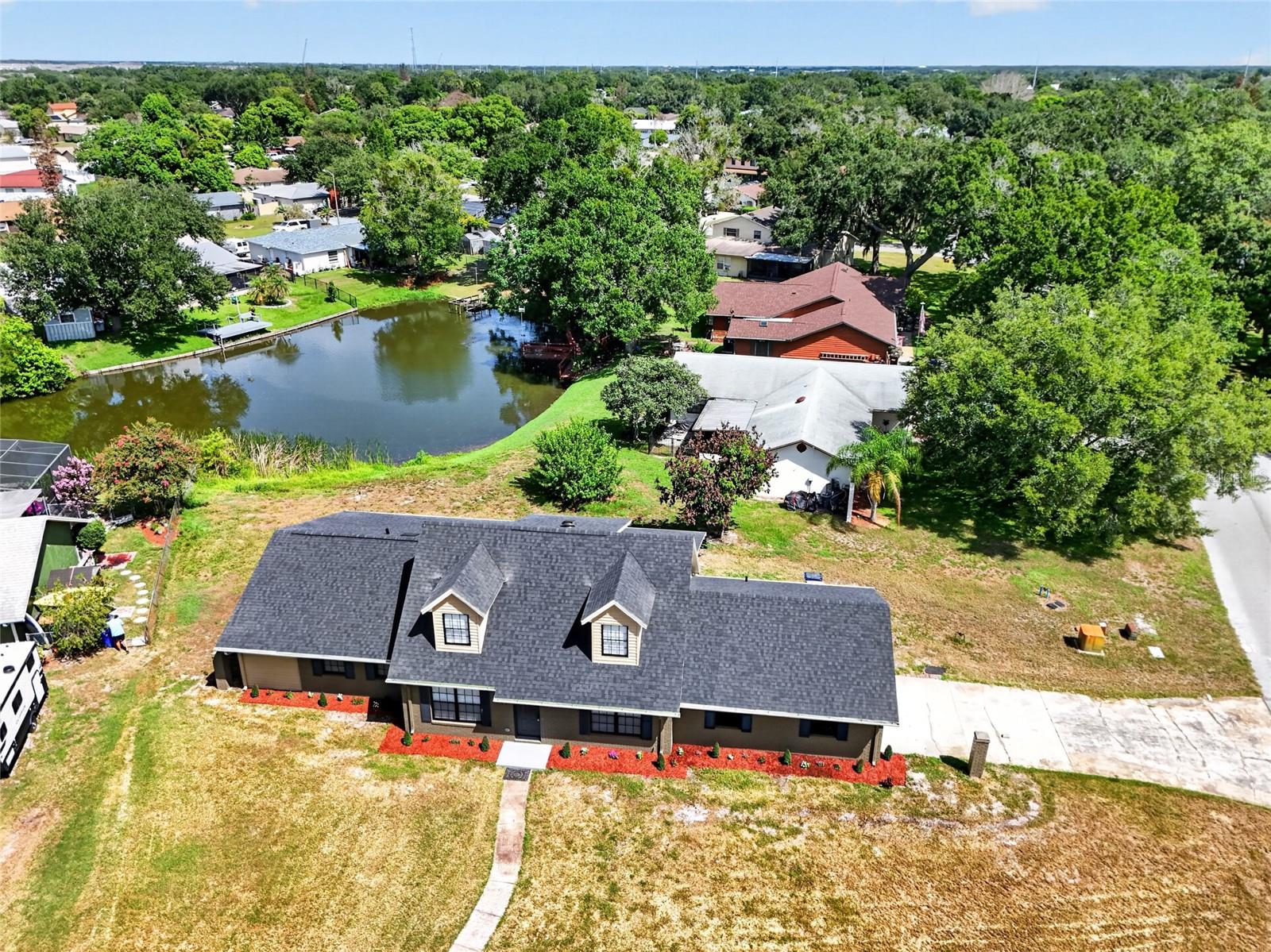 Beautiful Lakefront five bedroom three bath home for sale in Saint Cloud. This lakefront home has been upgraded significantly, with a new kitchen, flooring, roof, paint, bathrooms and more. This home is absolutely perfect for a large family. It is a split plan for privacy and the master overlooks the lake.  There is more than enough space in the home for a large growing family. Situated on a spacious 0.34 acre lot in a wonderful safe and established neighborhood. Call today to schedule your showing.