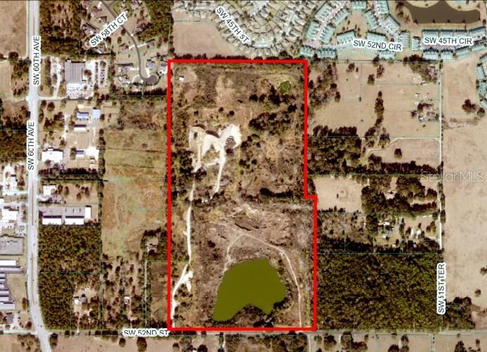 Well located 82.10 acres just off of SR 200 contiguous to Fore Ranch and The Hunt Club subdivisions and close to retail, restaurants, schools, and hospitals. The property was a former lime rock mine with one large pond and two smaller ponds. The topography changes throughout the property are one of a kind for this area and would make for a very unique residential development. Both parcels are currently zoned A-1.