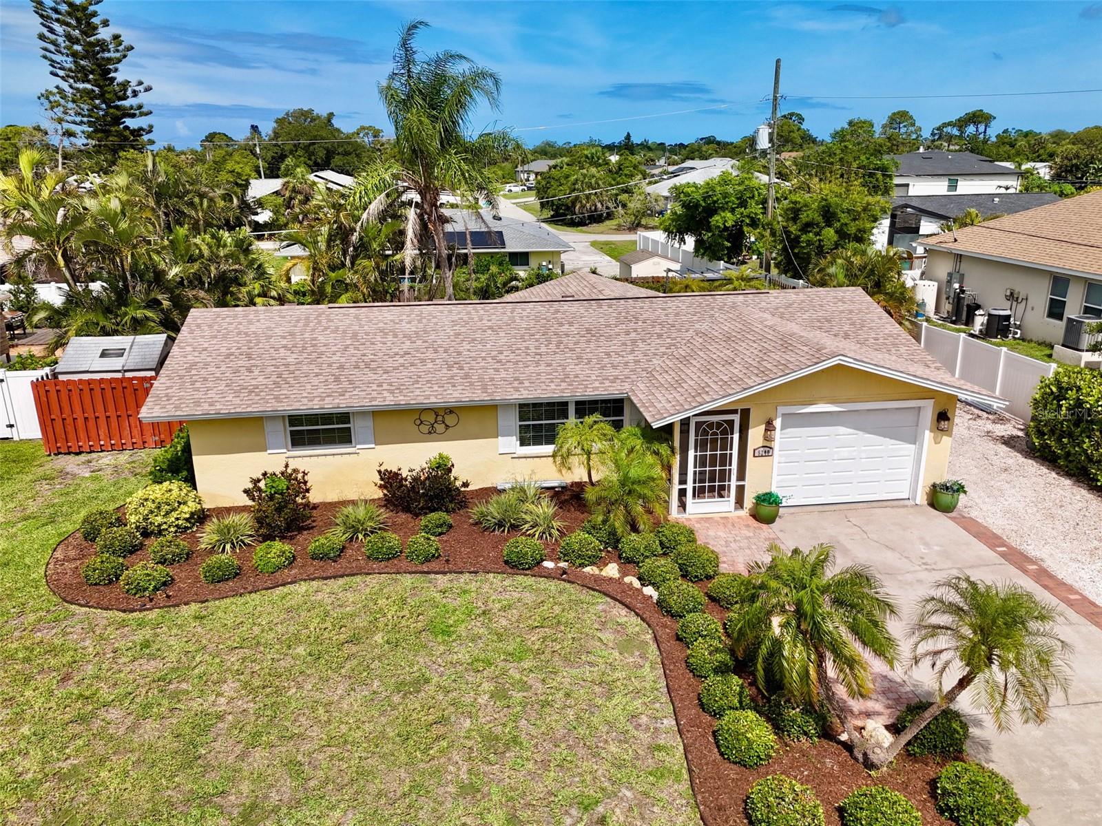 Experience Florida paradise in this beautifully updated, fully furnished 2-bedroom, 2-bathroom single-level home located in South Venice! Classic architectural details like elegant crown molding and chair rails welcome you into a lovely interior featuring a wonderful kitchen with white cabinetry, stainless sink, and granite countertops. Step outside into your private, professionally landscaped outdoor oasis, boasting a fenced backyard, two custom patios, (one terrazzo, one brick paver) with landscape lighting, a well-fed irrigation system, and two detached storage sheds. Ample side RV/boat parking for the bigger toys! Complete peace of mind is built right in to this home with a brand-new water softener, 3 year old roof, newer updated windows, and reverse osmosis water filtration system. Nestled in an unbeatable South Venice location, you are just minutes from pristine Gulf beaches and boat ramps, and not far from the recently redone Challenger Park. Plus, this area is zoned for the brand-new, state-of-the-art Wellen Park High School opening this August 2026! Schedule your showing today and step into your very own slice of Florida heaven!