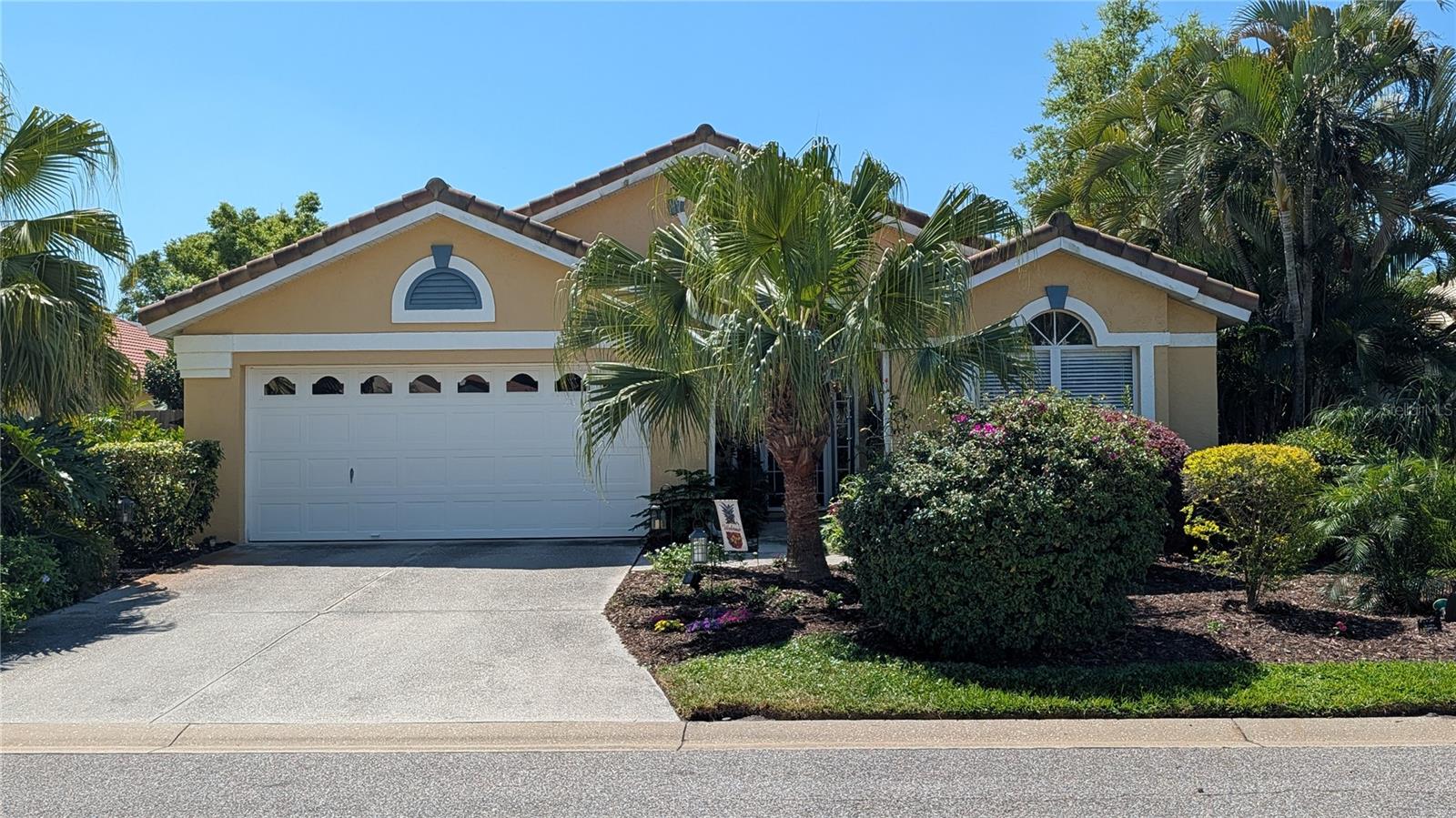 Experience the perfect blend of long-term pride of ownership and modern peace of mind in this impeccably maintained residence in a 39 home community within the Palm Aire Country Club. This private pool home has been cared for with the highest standards of excellence. Nestled within a lush landscape of vibrant Florida greenery, the property offers an oasis complete with a sparkling personal pool—the ultimate setting for enjoying the Sunshine State’s year-round warmth. Structural updates provide total worry-free living, including a complete whole-house replumbing, a long-lasting tile roof replacement, a new water heater, a high-efficiency AC system, and a fresh coat of exterior paint that provides striking curb appeal. The interior features thoughtful modernizations, highlighted by a stunning, recently updated shower in the primary suite’s master bath. The open-concept layout flows naturally toward the lanai, making it ideal for both quiet relaxation and entertaining. The property’s perimeter has also been recently enhanced with a full fence replacement, specifically designed with reinforced doors and sturdy footers for maximum privacy and durability. Combined with a very low HOA, these high-quality updates ensure this home is move-in ready and designed for low-maintenance living for years to come. Perfectly situated in a sought-after area, this home offers an unparalleled Florida lifestyle. You are just minutes from the premier shopping, dining, and vibrant community events at University Town Center (UTC) and Lakewood Ranch, as well as the top-rated medical facilities and A-rated schools the area is known for. For those who love the water, the world-class white sands of Siesta Key and Anna Maria Island are within easy reach, offering a quick escape to the Gulf’s turquoise waves. This is a rare opportunity to own a home that has been loved and is now ready for its next chapter.