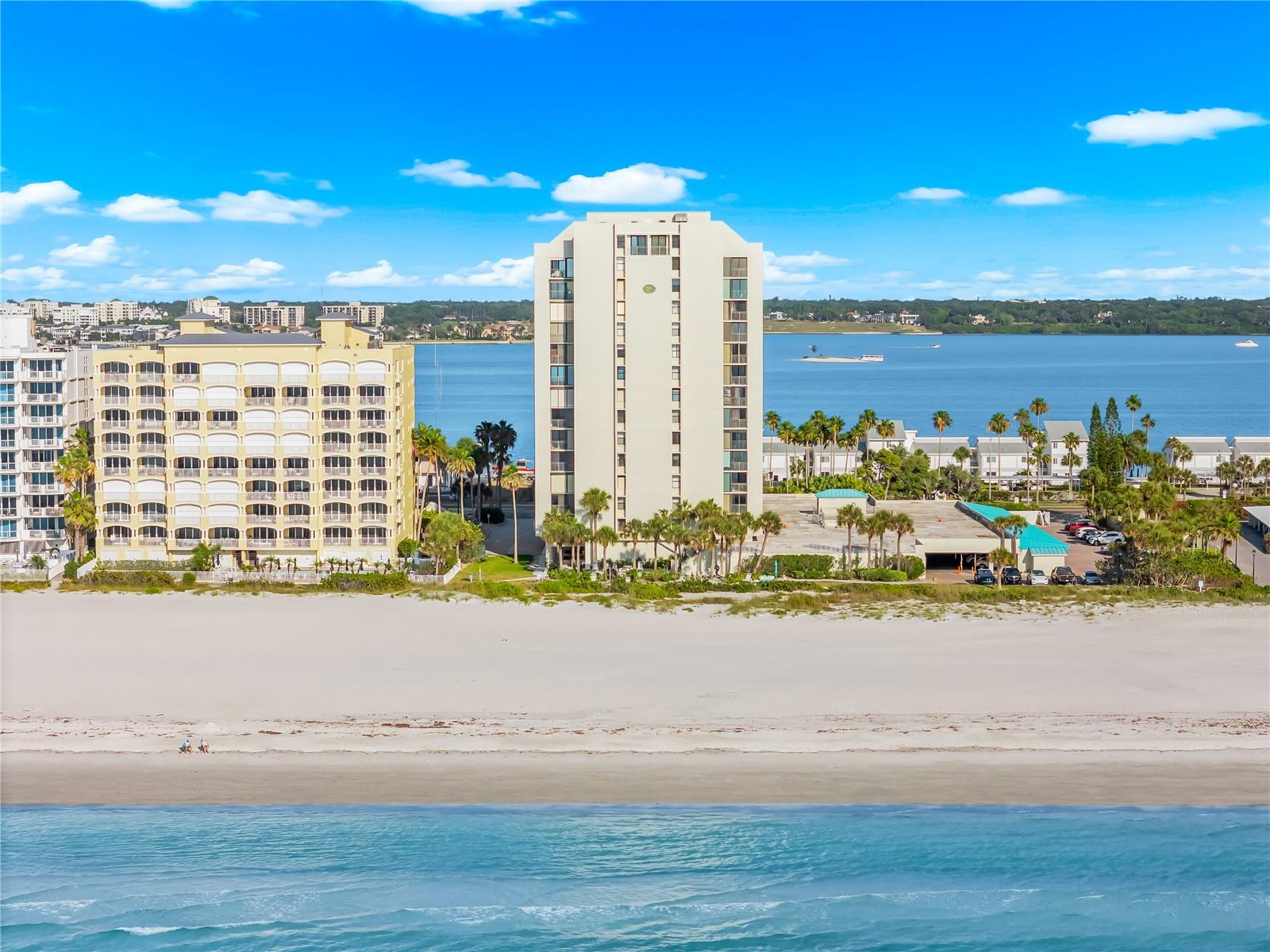 Experience elevated coastal living in this stunning penthouse condo on Sand Key Beach. This spacious 3/3/1 residence offers breathtaking Gulf views and unforgettable sunsets from your own private balconies off the living, dining, and primary suite. The upper level boasts a loft with breathtaking views overlooking the main living space, as well as a flexible bonus room that can easily function as a fourth bedroom, enhancing the home’s warm and inviting feel. Beautifully updated interior featuring granite countertops, seamless vinyl flooring, and an open, light-filled layout. Only the Sand Key Club has a Lobby with 24/7 attendants and elevated pool deck that overlooks the Gulf, perfect for soaking up the sun or unwinding after a day on the sand.  Amenities include Club Room, Gym with Baths and Showers, and Sauna.  Ideally located just minutes from Clearwater Beach, dining, shopping, and entertainment, this residence offers a rare combination of privacy, comfort, and effortless beachfront living. Leasing is permitted with a minimum 3 -month term up to four times a year. Kick off your shoes, embrace the beach lifestyle, and retreat to your private penthouse sanctuary. Opportunities like this are rare. Life is short—own the beach!