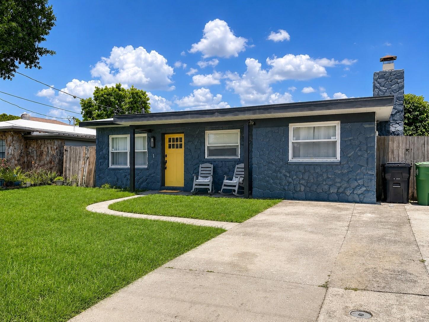 Virtually Staged. Welcome to this beautifully renovated, move-in ready home located in the heart of West Tampa, where modern updates, exceptional flexibility, and an unbeatable location come together to create an outstanding opportunity. Extensively updated this home features luxury vinyl flooring throughout, fresh interior and exterior paint, updated lighting, and a beautifully remodeled kitchen complete with new cabinetry, stainless steel appliances, stylish countertops, designer backsplash, open shelving, and updated fixtures. The spacious living room is highlighted by a charming wood-burning fireplace, creating the perfect gathering space. The updated bathroom showcases a modern vanity, upgraded fixtures, and a beautifully tiled walk-in shower. Additional improvements include a new HVAC system, tankless water heater, new exterior electrical panel, updated kitchen and bathroom cabinetry, new bedroom flooring, upgraded faucets, and a Nu-Calgon iWave-R whole-home air purification system installed within the HVAC system for enhanced indoor air quality.
One of the property's most desirable features is its flexible floor plan with two separate exterior entrances, offering excellent potential for dual living arrangements or additional income-producing possibilities. Whether you're looking for a primary residence, multi-generational living, or an investment property, this home offers exceptional versatility. The location also presents an outstanding opportunity for short-term rental use, making it an attractive option for investors seeking strong income potential.
Enjoy outdoor living with a covered front porch, screened lanai, fully fenced backyard, and detached storage building offering additional space for storage, hobbies, or a workshop.
Perfectly positioned just minutes from Midtown Tampa, International Plaza, Tampa International Airport, Raymond James Stadium, Downtown Tampa, Hyde Park, the Westshore Business District, Tampa Riverwalk, award-winning restaurants, shopping, entertainment, and Florida's beautiful Gulf Coast beaches, this home places you near everything that makes Tampa one of the nation's most desirable places to live and invest. Beautifully updated, move-in ready, and offering incredible flexibility in a prime location, this is an opportunity you won't want to miss.