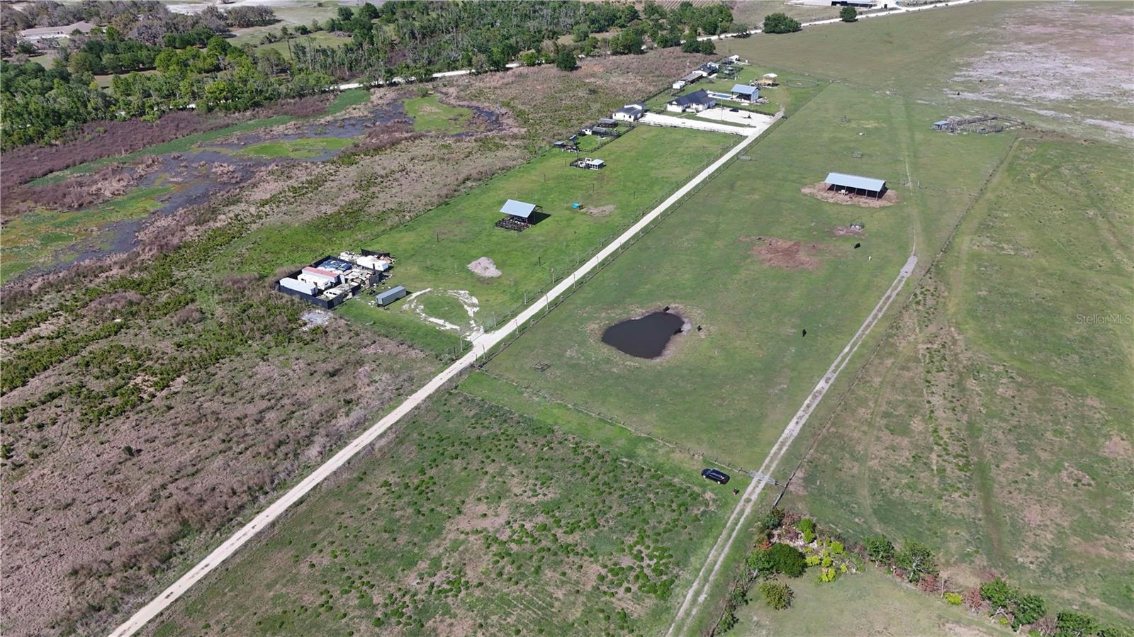 Cattle Ready 7 Acre Farm with Wells, Barn, and Pond

Beautiful and functional 7 acre cattle ready property, fully fenced with durable barbed wire and cross fenced for efficient livestock management. Designed with practicality in mind, the property features a dedicated staging paddock and a working loading chute, making cattle handling simple and efficient.

Water resources are excellent with two wells on site, including a shallow sand well and a 375 foot deep well, providing reliable water supply for livestock and land use.

The property includes a spacious 40 by 60 foot pole barn offering ample room for equipment, hay storage, or agricultural operations. A small pond adds both utility and charm, providing an additional water source and enhancing the natural beauty of the land.

Ideal for cattle, hobby farming, or a private agricultural homestead, this well equipped property is ready to go from day one.