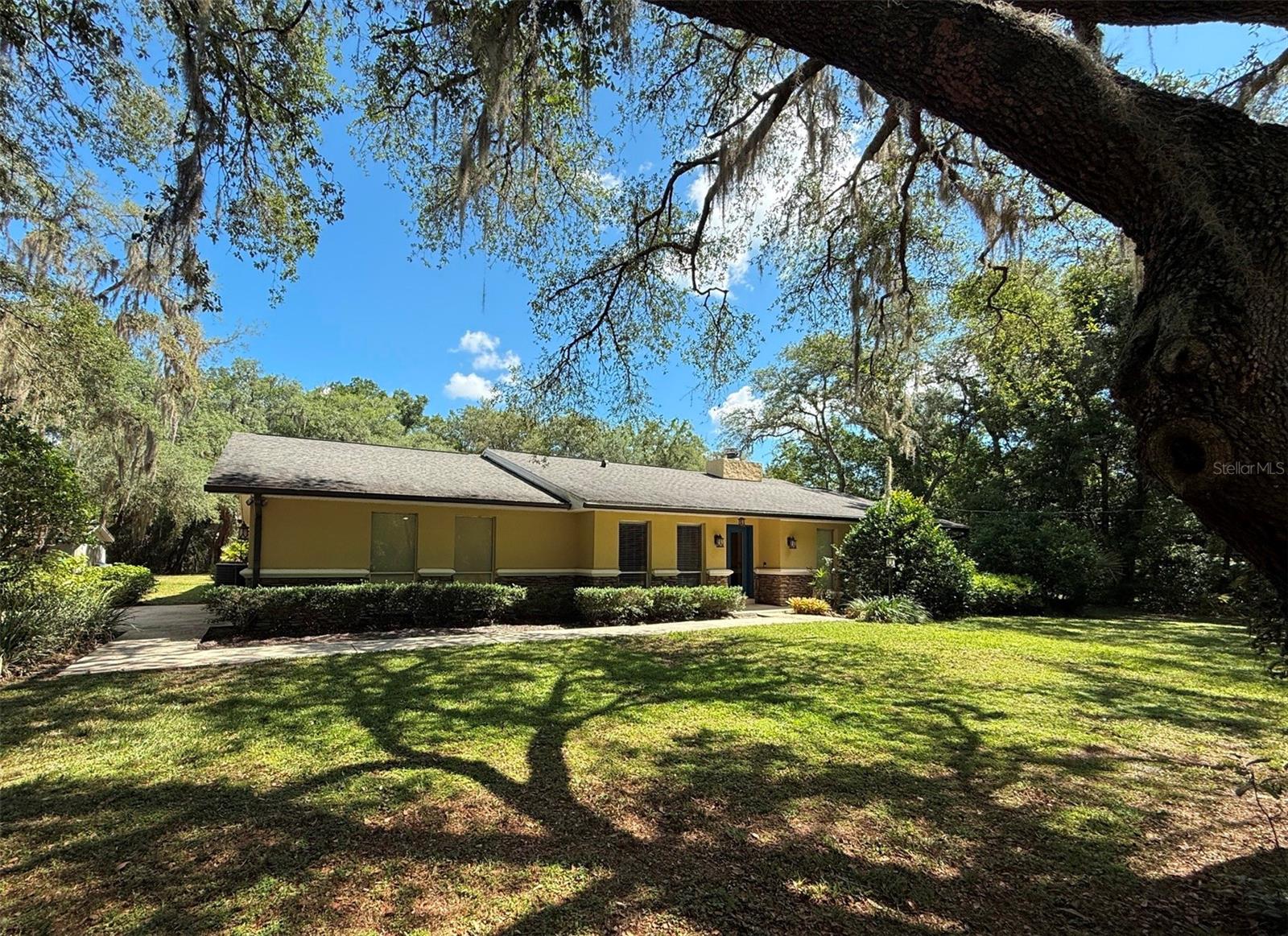 If serenity and privacy are important to you, this 5 acre property, located in the heart of Heathrow right off of Seminole County's highly sought after Longwood Markham Road, is for you.  This beautiful, oversized lot and home are tucked away on a private road and perfectly located for access to Colonial Town Park, the Seminole Wekiva Bike Trail, I-4, and State Roads 417 and 429.  Just a short drive to the beaches and Disney, location is everything - with NO HOA!  The home has an open-floor plan with four spacious bedrooms.  The large patio and deck surround the pool area with views of the secluded and picturesque backyard.