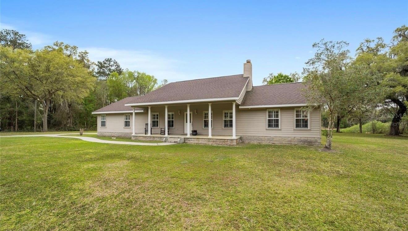 10 Acre Farm located in Morriston 2002 modern 3/2Open Floorplan - Ranch with gated entry and newly fence paddock less than a mile to HITS and just minutes to WEC!  If you're seeking the equestrian lifestyle just minutes from everything yet has the country feeling this one is for you. Super nice home with 2 car garage featuring and bicycle storage this home is a total of 2875 sq. ft. of delightful living space.  Some of the prettiest 10 acres in Morriston on paved road and a great school system.  Schedule your showing this one won't last long.