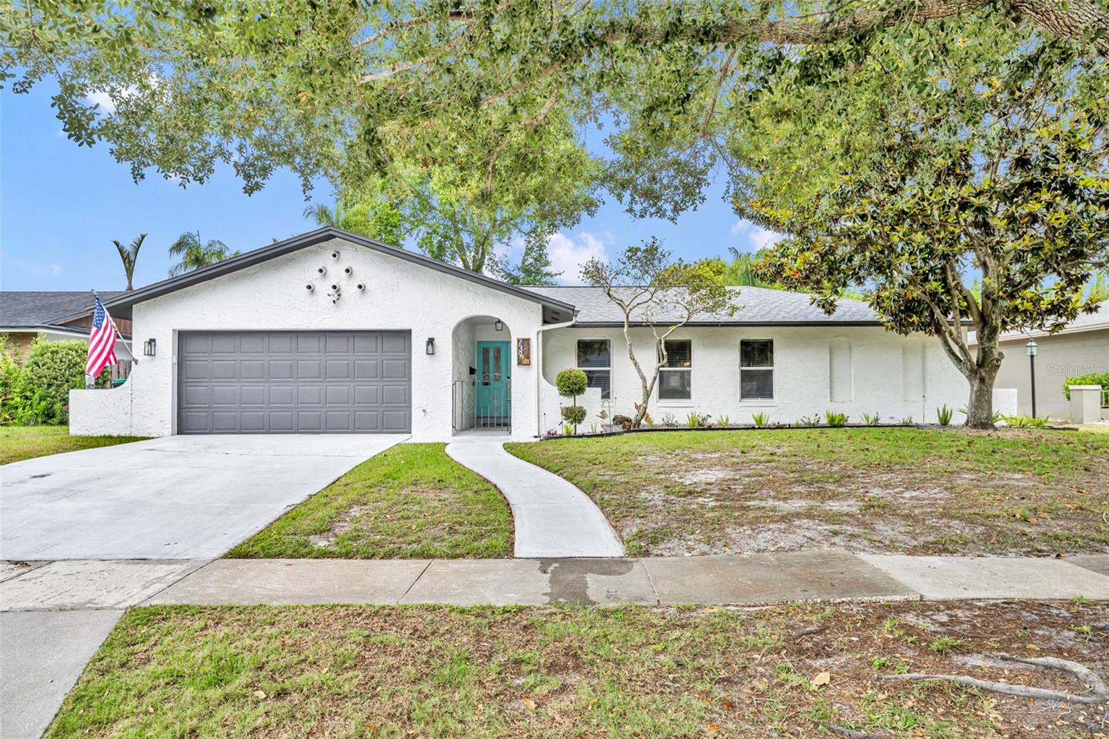 Welcome to Winter Park Pines, one of Winter Park’s most desirable neighborhoods. This updated 5 bed, 3 bath pool home features a split floor plan, generous room sizes, and wood-plank tile flooring throughout most of the home. Inside, the formal living and dining rooms flow together and overlook the pool through French doors, while the large primary suite offers an en-suite bath, walk-in closet, and its own French doors to the huge covered, insulated patio. The light and bright kitchen includes a large breakfast bar, built-in pantry, and white cabinetry and appliances, and opens to the family room with a wood-burning fireplace and built-in desk. A separate bedroom wing provides four generous guest bedrooms and two full baths, including a Jack-and-Jill setup with walk-in closet, plus a true pool bath with access to the backyard and an inside utility/laundry room.
Outdoor living is a highlight, with a fenced backyard, kidney-shaped pool, plenty of deck space, and ample yard beyond the pool so you’re not sacrificing green space. The large covered, insulated patio is ideal for year-round use. Major updates include a new roof (2022), new electric panel and updated outlets (2022), water lines re-piped to CPVC by a previous owner, new fence (2023), new dishwasher (2024), new water heater (2025), newer stove, washer, and dryer, new light fixtures throughout, and bathrooms updated with modern colors and fixtures. The exterior, garage, patio, and pool deck have all been freshly painted, giving the home a clean, move-in ready feel. This is a rare opportunity to own a well-maintained pool home in a prime Winter Park location—just steps from Cady Way Park and Trail and moments from Winter Park Pines Golf Course, with Winter Park High School and the nearby hospital campus within short distance and quick access to downtown Orlando, major highways, both airports, Disney, and Universal.