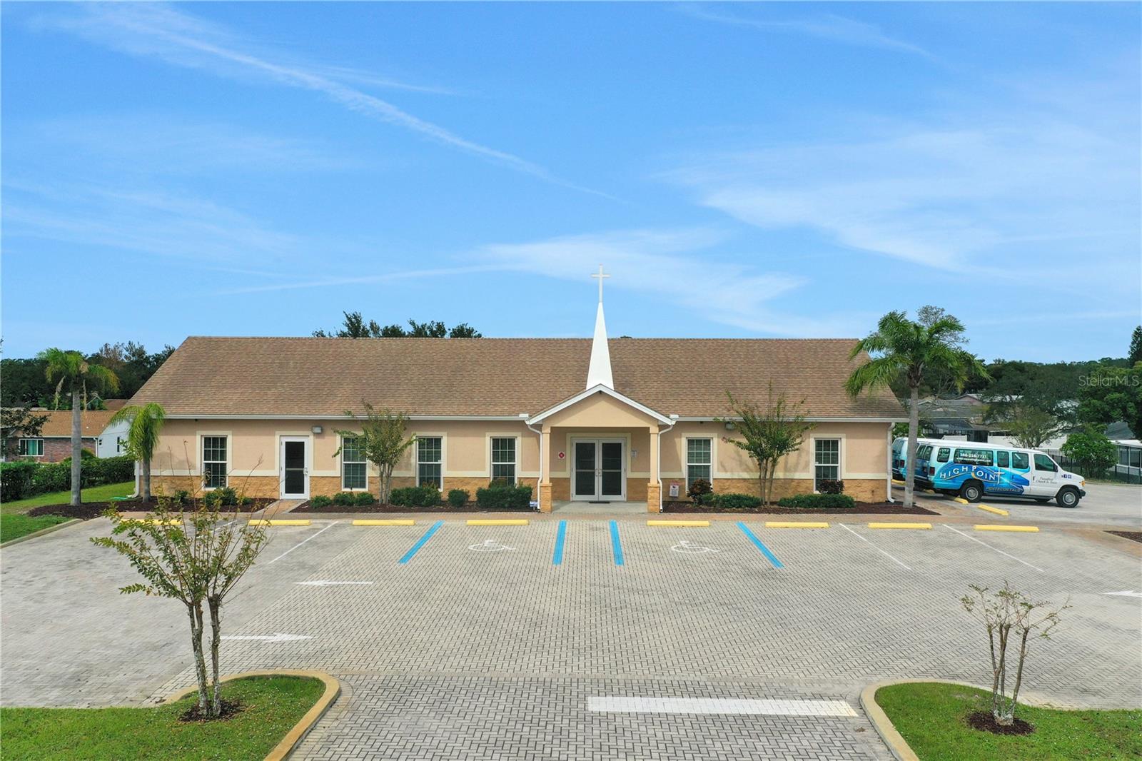Pristine commercial building sitting on over 2 acres of prime real estate in the coveted city of Port Orange! Currently operating as a church but can easily be converted into a medical office, professional office space, nursing home or day care just to name a few. With room to expand the opportunities are endless with this parcel. Located on Herbert Street with a tremendous amount of exposure with a freestanding monument sign. Paver parking lot consists of 25 parking spaces.