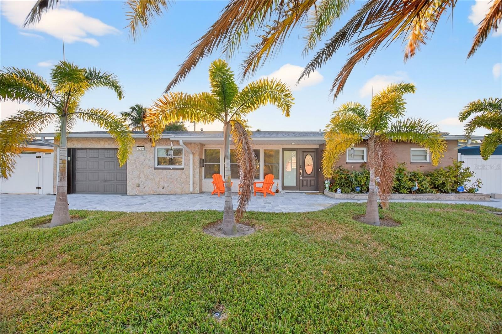 Spectacular coastal property located at the entrance of Fort De Soto Park, within the highly desirable Maximo Moorings area of St. Petersburg, Florida, recognized for its breathtaking sunrises, award-winning beaches, boating lifestyle, and exceptional residential atmosphere.

This beautifully remodeled and meticulously maintained residence features 4 bedrooms, 2 bathrooms, approximately 1,676 square feet of living space, and sits on nearly a quarter-acre lot with excellent elevation. One of the most important features of this property is that it has NOT been affected by flooding or hurricane damage within the last 10 years.

The property offers oversized parking with space for an RV or boat up to 36 feet, making it ideal for those looking to fully enjoy the Florida coastal lifestyle with NO HOA restrictions.

Highlighted upgrades and features include:

• Roof replaced in 2018
• A/C system installed in 2018
• Entire-home water filtration system
• Reverse Osmosis system
• Professional air purification system valued at approximately $10,000
• Over 6,000 square feet of newly installed pavers
• New flooring throughout the home
• Remodeled kitchen and high-quality interior upgrades
• St. Augustine landscaping
• Fully operational wireless irrigation system
• Entire property monitored with Brinks Security and Ring systems
• 8 installed security cameras

Additionally, the property already includes an approved permit for the construction of a 13x25 pool plus jacuzzi, offering incredible potential to create a private resort-style outdoor living area.

The property may also be sold fully furnished for an additional cost, making this a true turnkey opportunity ready to enjoy as a primary residence, second home, vacation property, or investment opportunity.

Located within minutes of Maximo Marina, waterfront tiki bars, restaurants, shopping, and entertainment. The property is exceptionally well located near Publix, Walmart, Walgreens, Target, marinas, waterfront dining, fishing, kayaking, and many of St. Petersburg’s most desirable coastal attractions.

Prime location just minutes from:
• Fort De Soto Park
• St. Pete Beach
• Downtown St. Petersburg
• Gulf beaches and waterfront entertainment

This is a rare opportunity to own a highly elevated, fully updated, move-in-ready coastal property in one of Florida’s most attractive and desirable beachside markets.

Serious and reasonable offers will be considered.