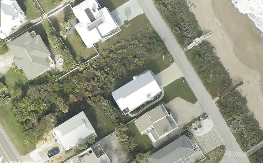 This is one of the last lots in Bethune Beach where you own a dune parcel for direct access and at a very little used and 'High & Dry' section of natural beach. An added bonus is that the 50 x 100 lot directly behind and adjacent ( with it's own dune lot) is available for only $215K if you'd like a Turtlemound to ocean parcel to build or possibly two homes, guest home with garage, pool in between, etc. A very unique situation for a nice oceanfront extended family or guest complex.; Cleared: No ;Water: Available at Site ;Water: City