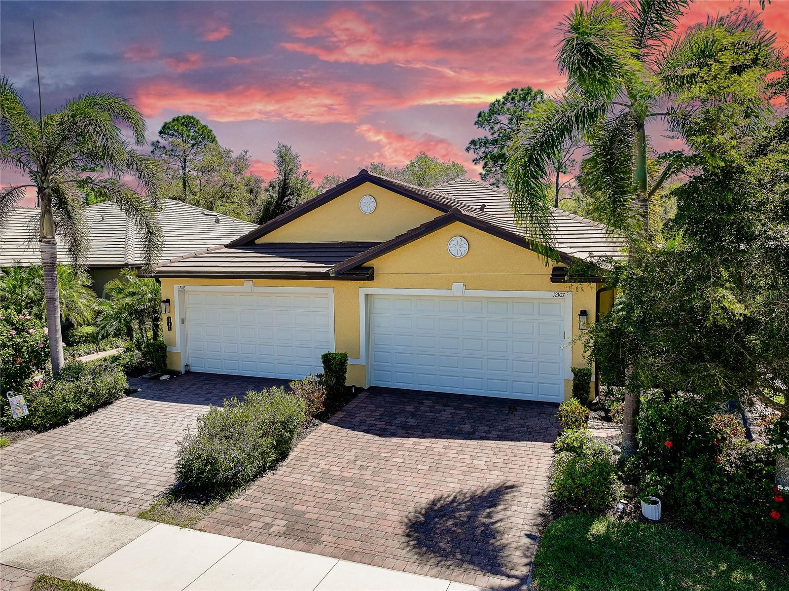 Welcome to The Preserve, a charming and boutique gated enclave located within the sought-after West Villages District of Wellen Park. Experience easy Florida living in this beautiful villa, lightly lived in as a mostly part time home and perfectly positioned on a premium preserve homesite that offers rare privacy and peaceful views—something you won’t often find in this community. Plus, the property is located in Flood Zone X, meaning no flood insurance is required.

This thoughtfully designed home features 2 bedrooms, 2 full baths, and a versatile office/den. You’ll appreciate the seamless ceramic tile flooring throughout—no carpet anywhere—along with upgraded lighting and ceiling fans. Elegant plantation shutters are installed throughout the entire home, offering a timeless look along with privacy and low-maintenance convenience.

A discreet side entry adds to the home’s curb appeal and functionality, while a recently added paver sidewalk provides easy access to the backyard. Relax and unwind on the screened lanai, complete with paver flooring, a ceiling fan, and tranquil preserve views surrounded by lush greenery.

The kitchen is beautifully appointed with granite countertops, 42” upgraded cabinetry with under-cabinet lighting, stainless steel appliances, a stylish glass and stone backsplash, upgraded faucet, garbage disposal, and large pantry and additional storage closet.

The laundry room includes additional 42” cabinetry for extra organization. 
In the primary suite, you’ll find space for a king-sized bedroom set, dual walk-in closets, and a well-appointed en-suite bath featuring dual vanities with granite countertops, upgraded cabinetry, a fully tiled walk-in shower with glass enclosure and a large linen closet.

The guest bedroom is privately situated on the opposite side of the home and includes a spacious closet. The guest bath is equally upgraded with granite countertops, enhanced cabinetry, and a tiled shower all the way to the ceiling.

Additional highlights include a spacious two-car garage with epoxy flooring, utility sink, automatic opener, and ample storage. The home’s neutral coastal color palette makes it truly move-in ready—just bring your belongings and start enjoying the lifestyle. 

Residents of Preserve enjoy maintenance-free living along with access to a resort-style amenity center featuring a pool, clubhouse, fitness center, bocce ball, and pickleball courts. Ideally located just minutes from CoolToday Park, the spring training home of the Atlanta Braves, where you can enjoy games, events, a Tiki bar, and more. You’ll also be close to the exciting Wellen Park Downtown area, offering shopping, dining, entertainment, farmer's market and outdoor recreation around a scenic lake.

With easy access to I-75, downtown Venice, and the beautiful Gulf Coast beaches, this home offers the perfect blend of comfort, convenience, and Florida charm.
