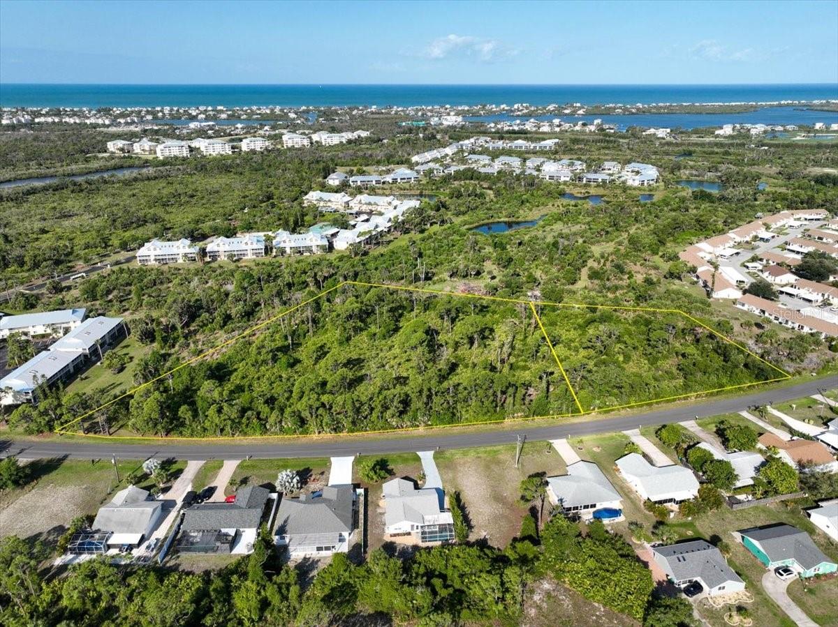 An exceptional development opportunity! This expansive vacant property, zoned RMF for 52 units, is perfectly positioned for a builder or investor looking to create a premier residential community on Florida's Gulf Coast. Located just minutes from Gulf beaches, boating, fishing, waterfront dining, and year-round recreation this site offers the lifestyle todays's buyers are seeking. The highly sought-after and prestigious Boca Grande with its boutique shops, exquisite dining, luxury estates and world-famous Tarpon fishing, is also just a short drive away. Whether you're envisioning condos, townhomes, or a stylish multi-family enclave, this property delivers location, convenience and endless potential. Opportunities like this in such a prime coastal corridor don't come around often - secure your piece of Englewood's growth while it's still available.