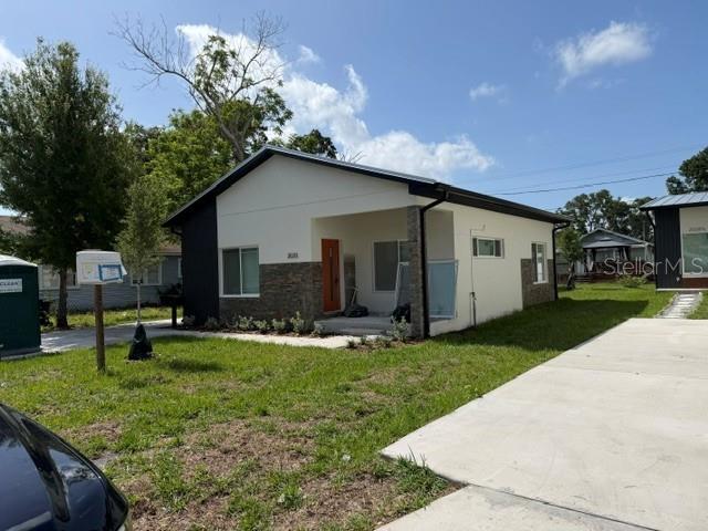 New Construction-  The property is setup like a duplex, the rear unit is rented separately, but detached.  The home is 2 bedrooms/ 2 baths just a little over 1000 sq ft.  High ceilings, beautiful kitchen with island, granite countertops, dishwasher, range, refrigerator and microwave.  Pet allowed upon approval.  Ready to move in now.