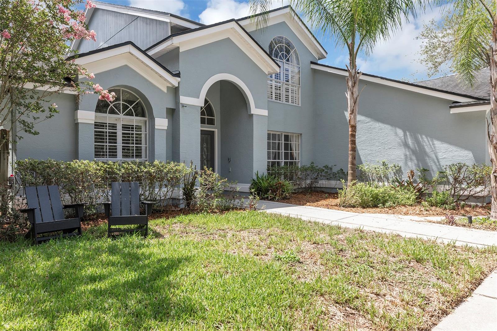 Welcome to this beautifully updated 4-bedroom, 2.5-bath pool home offering 2,682 square feet of thoughtfully designed living space on an exceptional oversized cul-de-sac lot of more than one-third of an acre. Located in one of Oviedo's most desirable neighborhoods, this impressive two-story home combines modern updates, functional living spaces, and an unbeatable location. The recently remodeled kitchen is the heart of the home, featuring a large center island, stylish finishes, and abundant workspace that opens seamlessly to the main living areas—perfect for everyday living and entertaining. The spacious first-floor primary suite has been completely renovated to create a luxurious private retreat, while all bathrooms have also been beautifully updated with contemporary finishes. Upstairs, a generous loft overlooks the family room below, creating the perfect space for a home office, media room, play area, or additional living space. Throughout the home you'll find easy-maintenance tile and laminate flooring with no carpet anywhere. Step outside to your own Florida oasis featuring a beautiful screened-in swimming pool and expansive backyard with plenty of room to relax, entertain, or play. The oversized showcase cul-de-sac lot offers exceptional curb appeal, privacy, and space rarely found in today's market. Conveniently located just minutes from UCF, major employers, shopping, dining, and convenient access to major roadways, this home also benefits from highly rated Seminole County schools. Combining extensive recent renovations, an outstanding floor plan, an incredible lot, and an exceptional location, this move-in-ready home is one you won't want to miss.