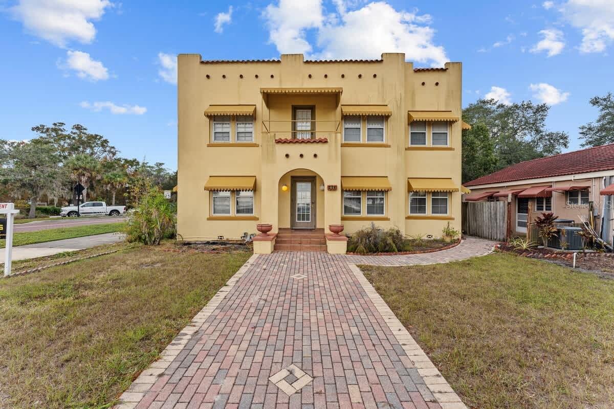 Positioned along the storied shoreline of Lakeshore Boulevard, this rare income-producing property and location captures the timeless character of Historic Downtown Kissimmee with an address that places lifestyle, recreation, and long-term upside in one compelling package. Comprising six separate income producing apartments, 4 furnished and 2 unfurnished, with a total of 9 bedrooms and 6.5 baths. Property presents a remarkable opportunity for investors seeking immediate rental income or the possibility of a boutique hotel location in one of Central Florida’s steadily evolving waterfront corridors. Originally constructed in 1930, the building carries an architectural presence rarely replicated today blending vintage charm, and an unmistakable sense of place with views and walkability that continue to drive tenant demand. Situated directly across from Kissimmee Lakefront Park, residents enjoy effortless access to the marina, waterfront trails, fishing pier, playgrounds, amphitheater events, dining, cafés, and downtown entertainment all without relying on a car. The building spans over 4,100 square feet on an oversized corner-style lot and features private parking, scenic water and park views, and a setting surrounded by mature trees and historic homes that give the neighborhood its distinctive identity. The property’s layout creates unlimited opportunities. Downtown Kissimmee continues attracting attention for its lakefront revitalization, expanding SunRail connectivity and tourism corridor. Assets with authentic architectural appeal and irreplaceable positioning near the waterfront are becoming increasingly difficult to secure particularly those offering multi-unit versatility near the city’s cultural core. For the discerning investor, this is legacy-style holding in one of Kissimmee's most recognizable districts, where historic ambiance, waterfront surroundings, and enduring rental appeal converge.