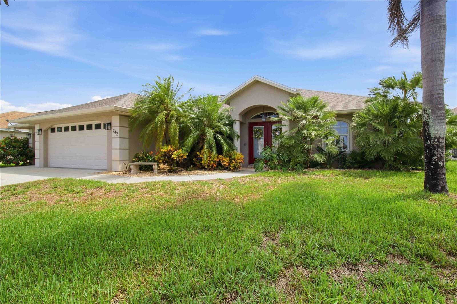 This beautifully maintained 3-bedroom, 2-bathroom, 3-car garage pool home on a canal is being offered TURNKEY, complete with Tommy Bahama furnishings that bring a relaxed, coastal elegance to every room.
Inside, you will find new tile flooring throughout, keeping the home cool and easy to maintain, along with updated lighting and ceiling fans that create a bright, airy feel.
The kitchen is both stylish and functional, featuring granite countertops, high-end stainless steel appliances, and updated cabinetry. The breakfast nook has sliding glass doors to the lanai and tiled flooring.
The master bedroom features a tray ceiling, sliding glass doors to the lanai, two walk-in closets, and tiled flooring. The master bath features a Roman shower, a double-basin vanity with a cultured marble top, and a linen closet.
Bedroom two has a generous wall closet and tiled flooring. Bedroom three has cathedral ceilings, sliding glass doors to the lanai, and tiled flooring.
Both bathrooms feature new high-rise commodes. The guest bathroom includes a tub/shower combination and a vanity with a cultured marble top.
The laundry room is located inside the home and offers built-in cabinets and a spacious work area. The windows feature Solar Shield protection.
Step outside and you'll understand what makes this home truly special. The spacious lanai overlooks a sparkling canal, offering a peaceful backdrop for morning coffee or evening cocktails. You can take a dip in your own heated pool any time of year, rinse off in the unique bamboo outdoor shower, or stroll down to your private dock, ideal for fishing or kayaking.
The lush tropical landscaping and fruit trees stay vibrant and green year-round thanks to a cost-efficient irrigation system fed directly from the canal.
Best of all, this property offers ultimate peace of mind. With a whole-house generator for total reliability, a new roof (2022), A/C (2021), fresh paint, and beautifully manicured grounds, you can focus on enjoying the Florida lifestyle.
This is one you don't want to miss. Own your own piece of Florida paradise.