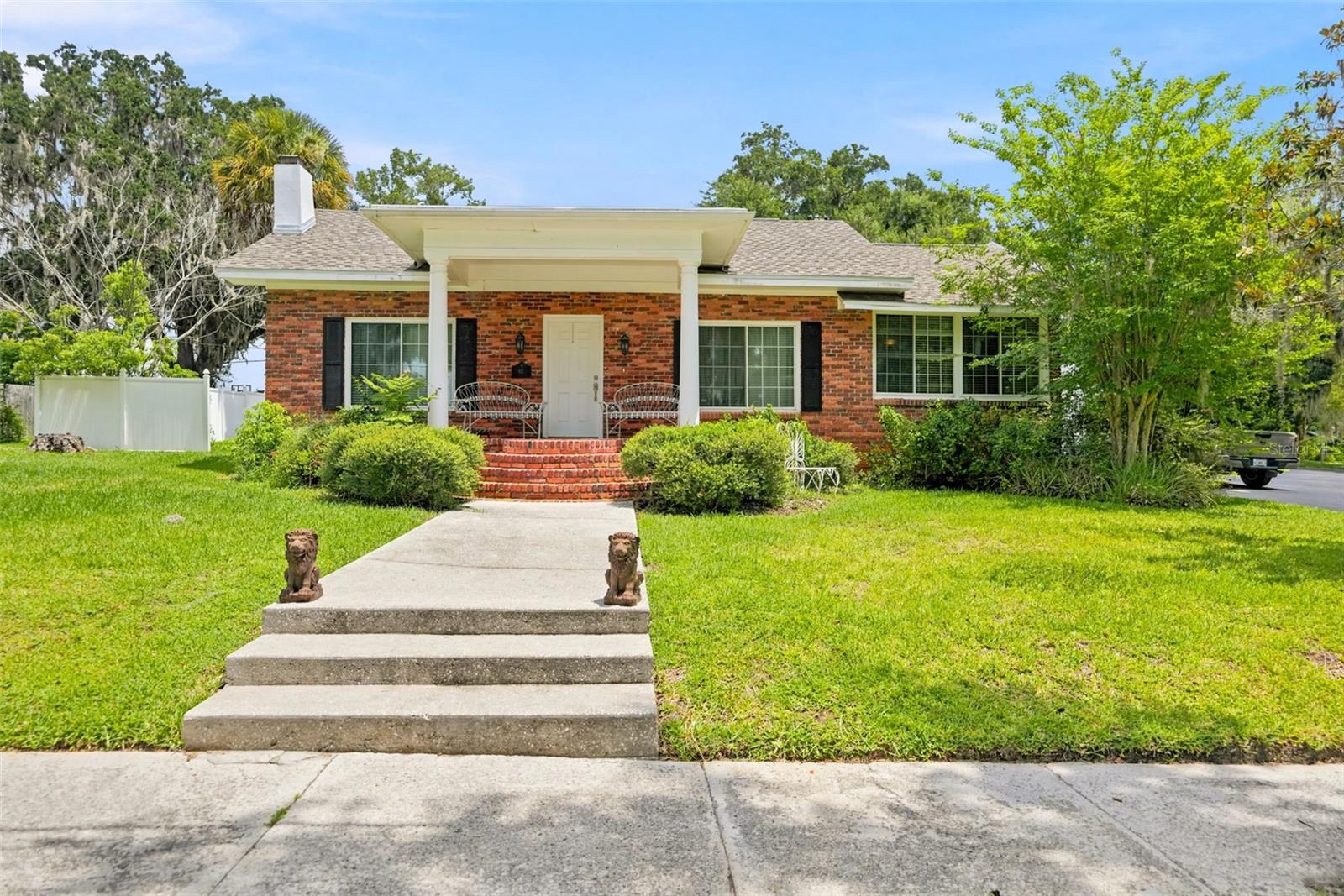 Rare Double Residential Property with two Century Homes in Historic Downtown Brooksville on a HUGE oversized corner lot at the corner of two of Brooksville's most desired roads...Olive Street and Bell Ave, both roads are made from historic bricks and are lined by century-old grandfather live oak majestic trees!! Just the location will take your breath away!! 

The main home, built in 1920, offers 1,961 sq feet of living space + 3 bedrooms (can be 4) + 3 bathrooms + gorgeous parlor rooms + a gorgeous brick front porch + built with all the character only a century old home can offer you! A brick wood burning fireplace takes you back in time when this home was one of the town's elite beauties!!  NEW ROOF on both homes!! 
The second century home was built in 1910, and offers just under 1,000 sq feet of living space + 1 bedroom + 1 bathroom. It is 2-stories with a private balcony overlooking historic Bell Ave!! 
The two Century Homes are joined by a beautiful, private gazebo to enjoy your morning coffee or evening drinks to relax...and host your family gatherings and celebrations like they did over 100 years ago!! The rare property is  surrounded by churches and majestic trees! 
The second home can be a guest home for your guests when they visit, or a rental-income property for a long term rental or turn it into an Airbnb's with short term rentals welcoming guests to Historic Downtown Brooksville as it is in walking distance to everything amazing Brooksville has to offer from local festivals, arts and crafts shows, music on the square, dining under the stars on Main Street, horse-drawn carriage rides at Christmas with the lighting of the Christmas Tree, the parades, and all the Hallmark Town experiences Brooksville offers!! 
All the character, all the charm, all the history, all the potential...this incredible property offers so much!! 
Come take a look...step back in time...and image a life as it was once lived in its glory of our town's history...and then make it your own! Honor its history, honor its location, and enjoy a life well-lived in a home built with care and love...not a track home built to look like every other home in the street.
Take a stroll back in time and come view this amazing property!! Only 45 minutes north of Tampa!!