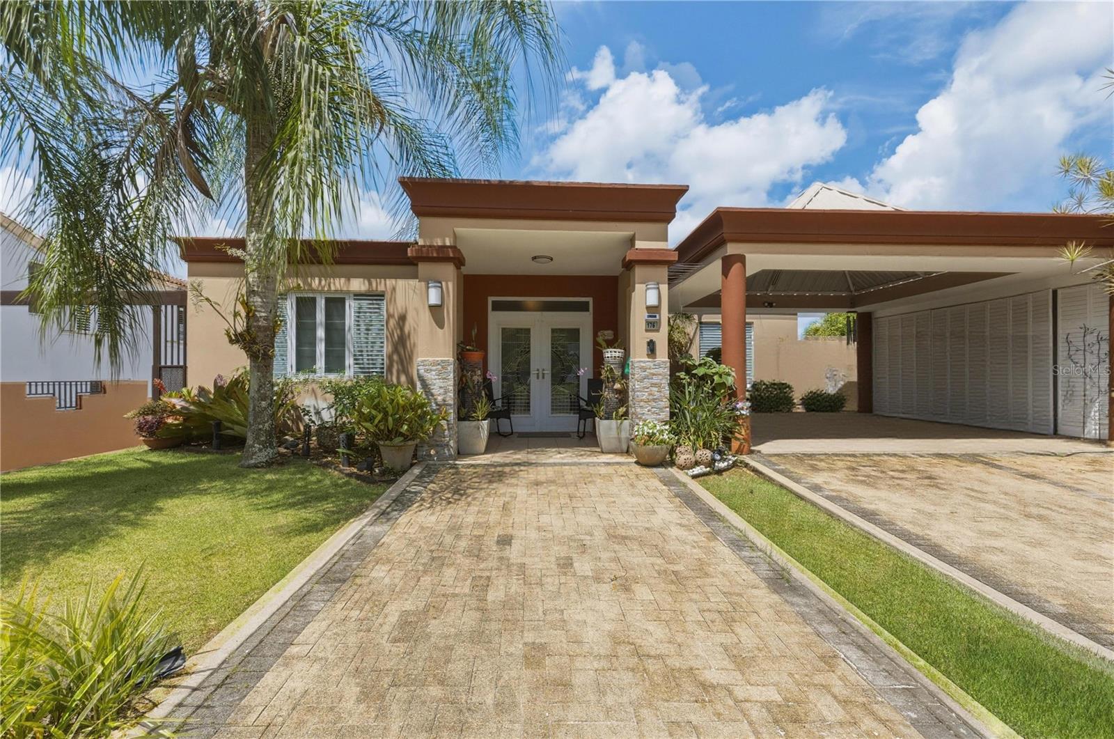 Spectacular Luxury Residence in Manatí!
Location: Yuisa Street, Lomas de Manatuabon Dev., Manatí, PR
Price: $672,000
Crimpr payment: $558

Stunning property combining elegance, privacy, and the perfect space for family entertainment. Located in an exclusive area with excellent connectivity, this residence features *2,542 sq. ft. of living area* on a spacious *1,002 sq. m. lot*, fully enclosed.

This property features a total of 4 bedrooms and 4 full bathrooms, offering a highly versatile layout and great potential.

Most of the living space is located on the upper level of the residence. The lower level, situated underneath the house, features a spacious gameroom, storage area, a full bathroom, and an ideal space for a laundry area, with full potential to be converted into an independent apartment. Crossing the central patio leads to the fantastic swimming pool with a cover, and on the other side, there is a cozy gazebo equipped with another independent full bathroom.

For vehicles, it offers a covered carport and a brick-paved driveway. Additionally, on the left side of the property, there is an extra entrance with a gate providing excellent space for more parking.

The house comes fully equipped with a power generator, water cistern, and storage room, ensuring comfort and safety just minutes away from hospitals, shopping centers, and major routes such as PR-149 and PR-642.

Schedule your viewing today!