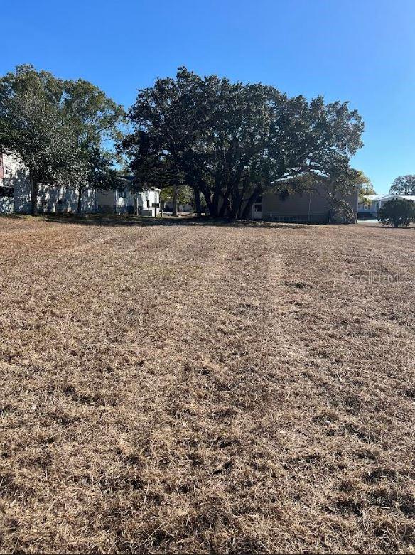 Bring your vision to life on this prime vacant lot located in the highly sought-after, gated 55+ community of Brookridge. Whether you are looking to build your Florida retirement oasis or seeking a savvy investment, this property offers the ultimate flexibility. Nestled on Brookridge Blvd, this lot provides easy access to the community’s premier amenities, including a championship golf course, clubhouse, swimming pool, and social activities. You are minutes away from the Suncoast Parkway, making travel to Tampa, pristine Gulf beaches, and local shopping a breeze. This lot is ready for your brand-new manufactured home. We specialize in manufactured home excellence. Ask about our exclusive dealership opportunities where you can select a high-quality model and coordinate a seamless purchase and installation package directly through us. Or just buy the Lot.