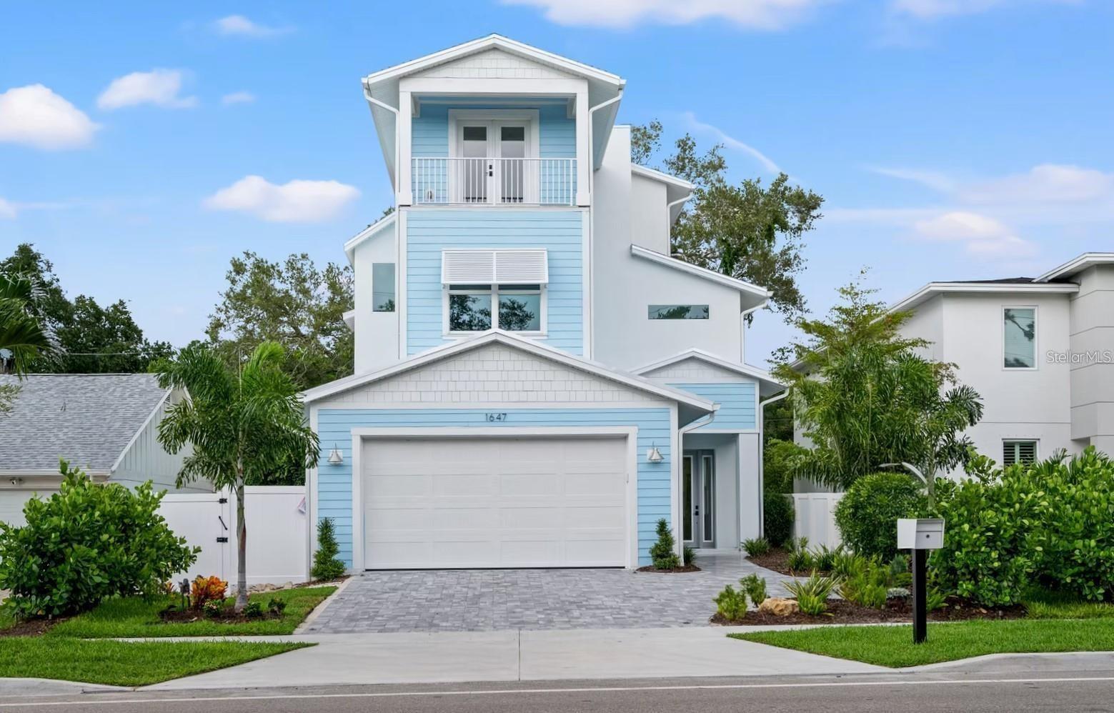 Welcome to this stunning coastal home with elevator, featuring 5 bedrooms, 2.5 bathrooms, and 3,023 square feet of living space. Additional opportunity to add bathrooms with modification add-on with the builder. From the moment you enter, you'll be captivated by the open floor plan, pool view, and fantastic design. This dazzling property, boasts an open floor plan that features high ceilings, natural light, and high-quality finishes throughout.

The home features a modern and elegant kitchen with top-of-the-line Cafe' appliances, quartz countertops, and custom cabinetry. The primary bedroom located on the upper level can be accessed by elevator is a true sanctuary, offering a plush and peaceful retreat. It boasts vaulted ceilings, en-suite bathroom that includes a soaking tub and a separate shower that's great for unwinding after a long day. The room also features a generously sized walk-in closet with abundant space for storage and organization as well as a private terrace. On the second floor you will find three vast bedrooms, with plenty of closet space for added convenience and comfort. One of the most notable features of the second floor is the sizable sundeck and balcony, which are attached to both bedrooms.  The laundry room is conveniently located on the second floor as well. The spacious bonus room offers endless possibilities, from an office, den, playroom, media center or a home gym.

This home has two patios with an outdoor area with a large pool and hot tub that seamlessly blend the indoor and outdoor living with meticulously planned landscaping.  Situated between Siesta Key and Downtown Sarasota, you will have easy access to some of the best beaches, restaurants, and shopping in the area. Whether you are looking for a day at the beach, a night out on the town, or a quiet evening at home, this home has everything you need.