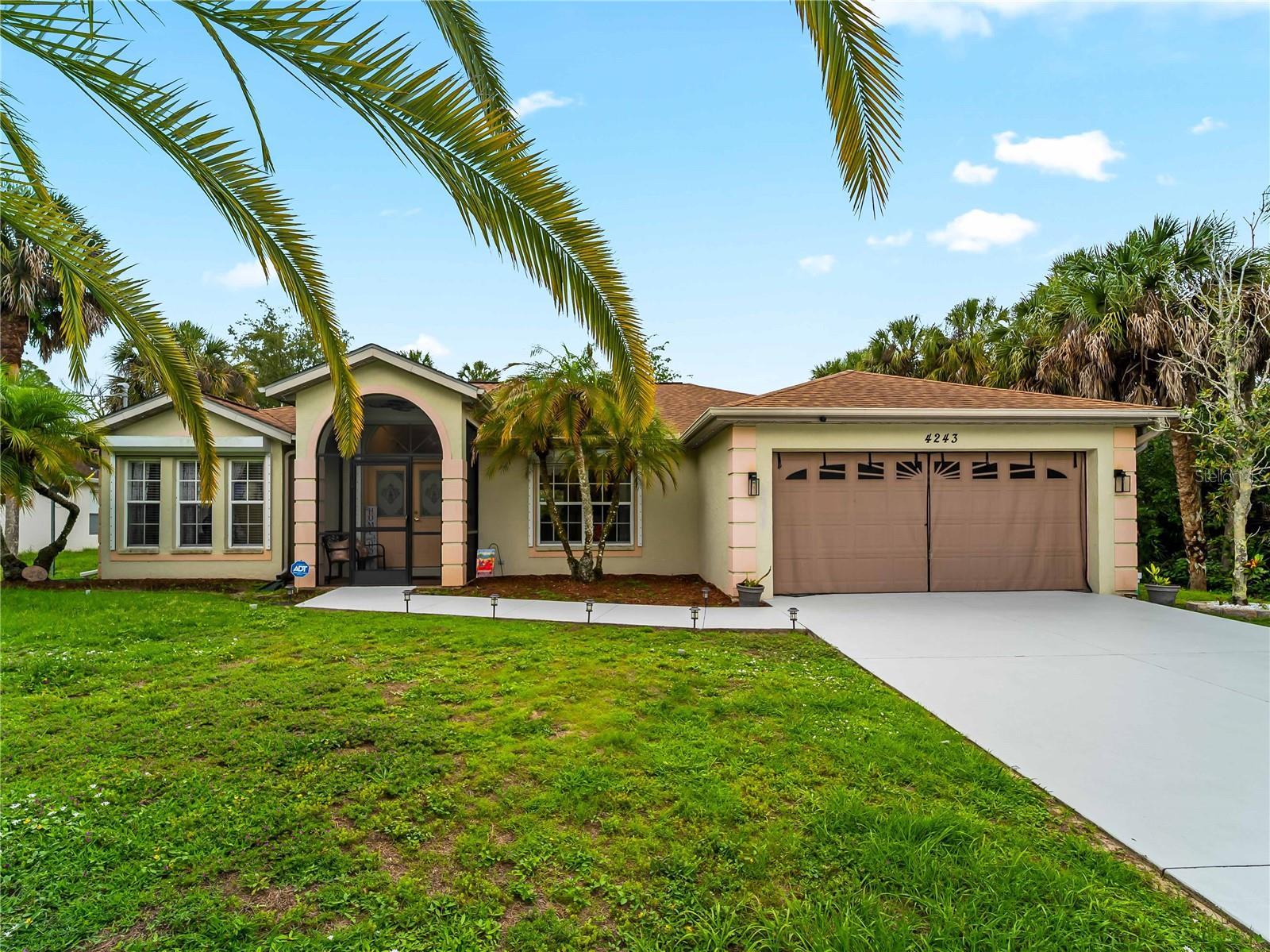 PRICE REDUCED! MOTIVATED SELLERS  Are Ready to Make a Deal—Schedule Your Private Showing Today!  Welcome Home to your piece of Florida Paradise! Move-in ready! This 3-bedroom, 2-bath, 2-car garage, HEATED POOL home with a fully FENCED backyard and CITY WATER is waiting for you. This well-maintained home features new flooring, updated light fixtures, 2020 HVAC & ROOF, ELECTRIC roll-down HURRICANE SHUTTERS, and a 2022 GENERATOR for added convenience and peace of mind. Inside, you’ll find high vaulted ceilings, spacious living areas, and a split-bedroom floor plan ideal for privacy and entertaining. The kitchen features a breakfast bar and all stainless steel appliances. Sliding glass pocket doors off the dining room opens to the spacious L-Shape screened lanai and private heated pool area with direct access from 2nd bathroom creating the perfect indoor-outdoor Florida lifestyle. The large backyard includes a storage shed and offers plenty of room for BBQs, pets, and outdoor activities. NO DEED restrictions, HOA, or CDD fees, NOT IN A FLOOD ZONE. Conveniently located in North Port near shopping, dining, golf courses, entertainment, medical facilities, award-winning Gulf beaches, and the Atlanta Braves Spring Training Stadium. Easy access to I-75 and US-41 makes commuting a breeze. Schedule your private showing today!