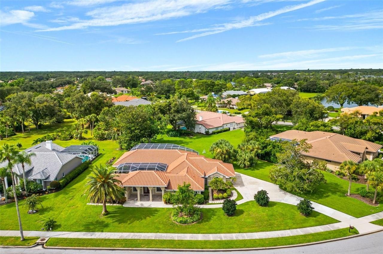 THIS IS THE ONE * "A" RATED SCHOOL DISTRICT * 3396 +/- SQFT A/C * 4 Bedrooms & 3.5 Baths * NEW BARREL TILE ROOF 2024 * NEW POOL HEATER 2024 * Upon walking onto the SPACIOUS front porch & into the GRAND foyer entry, you will see a BEAUTIFUL, SERENE, TRANQUIL WATER FEATURE WATERFALL BROOK PROVIDING A ZEN-LIKE AMBIANCE * TWO NEW HVACs in 2025 * NEW STAINLESS STEEL APPLIANCES 2025 * NEW WASHER & DRYER 2025 * NEW INTERIOR PAINT * This CUSTOM HOME offers a MULTI-GENERATIONAL DESIGN * 2 Primary Suites PLUS 2 Guest Bedrooms & 3.5 Baths * Formal Living Room boasts a cozy FIREPLACE * Formal Dining Room * The Chef's Kitchen has been THOUGHTFULLY REIMAGINED and features a Breakfast Bar Island, and is open to the Family Room * This home wraps the OVERSIZED HEATED CAGED POOL & SPA * It is the perfect home for entertaining or simply relaxing in your slice of paradise * The Main Primary Suite offers a Spa-style Bath and a very large walk-in closet * AN ABUNDANCE OF NATURAL LIGHT FROM THE MANY ARCHED WINDOWS & GLASS DOORS MAKE THIS HOUSE SHOW LIGHT & BRIGHT * The 3 Bay Side-load Garage provides ample space for 2 cars + your golf cart, workshop & all your toys * PRIDE OF OWNERSHIP SHOWS * ALMOST 1/2 ACRE and beautifully maintained with custom landscaping * Yard well for irrigation * This home is on an ALMOST 1/2 ACRE LOT and backs to an HOA Greenbelt area - it's an extremely PRIVATE SETTING * The home is also situated on a side street on the backside of Misty Creek, a wonderfully quiet area * Gated neighborhood with 24/7 security * BOTH LISTING AGENTS LIVE IN MISTY CREEK * Misty Creek Country Club is including 1 month free golf membership with the sale of this home * Membership to Golf & Country Club is NOT mandatory * LOW HOA FEES! * Country feel yet 5 minutes to the NEW Publix shopping plaza & Rothenbach Park * 20 minute drive to Siesta Key Beach or UTC Mall * "A" RATED SCHOOL DISTRICT * One look & you'll fall in love *