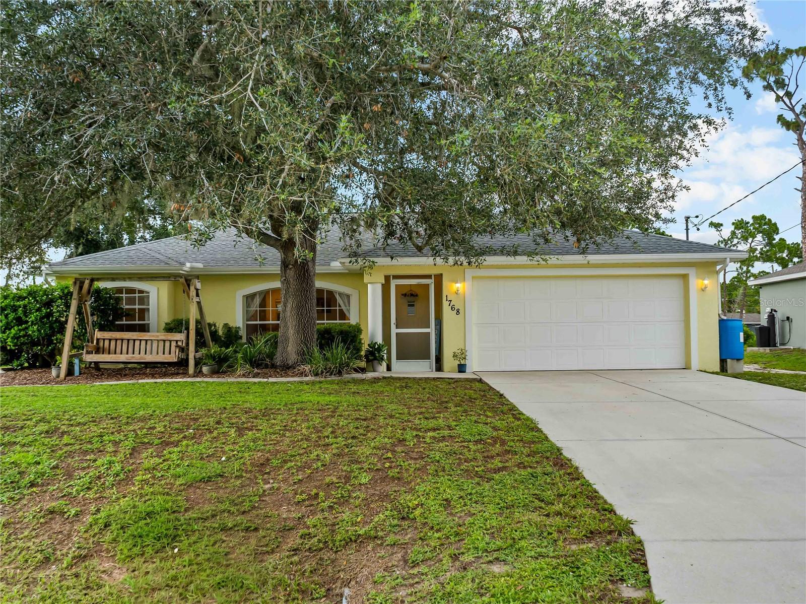 **Charming 3-bed, 2-bath home in vibrant North Port, FL!**

Welcome to 1768 Norvell Ave, a move in ready single family home offering 1,233 sq ft of comfortable living in one of Southwest Florida’s fastest growing and most affordable communities.

Inside, **vaulted ceilings** create a spacious, airy feel perfect for everyday living and entertaining. The home boasts **newer roof, HVAC, and water heater**, ensuring low-maintenance peace of mind.

Outside, relax in the **large backyard** complete with a **useful workshed** — ideal for hobbies, storage, or outdoor projects. The front yard features a **stunning oak tree** and **beautiful landscaping** for great curb appeal.

North Port shines as a true Florida gem: enjoy a lower cost of living, room to grow, and endless recreation with over 80 miles of freshwater canals for kayaking and fishing, extensive trails for biking and hiking, neighborhood parks, the Myakka State Forest, and the exciting Wellen Park expansion nearby. Close to beaches, shopping, and dining in Venice and Sarasota, it’s the perfect blend of small-town charm and modern convenience.

This is Florida living at its best — schedule your showing today!