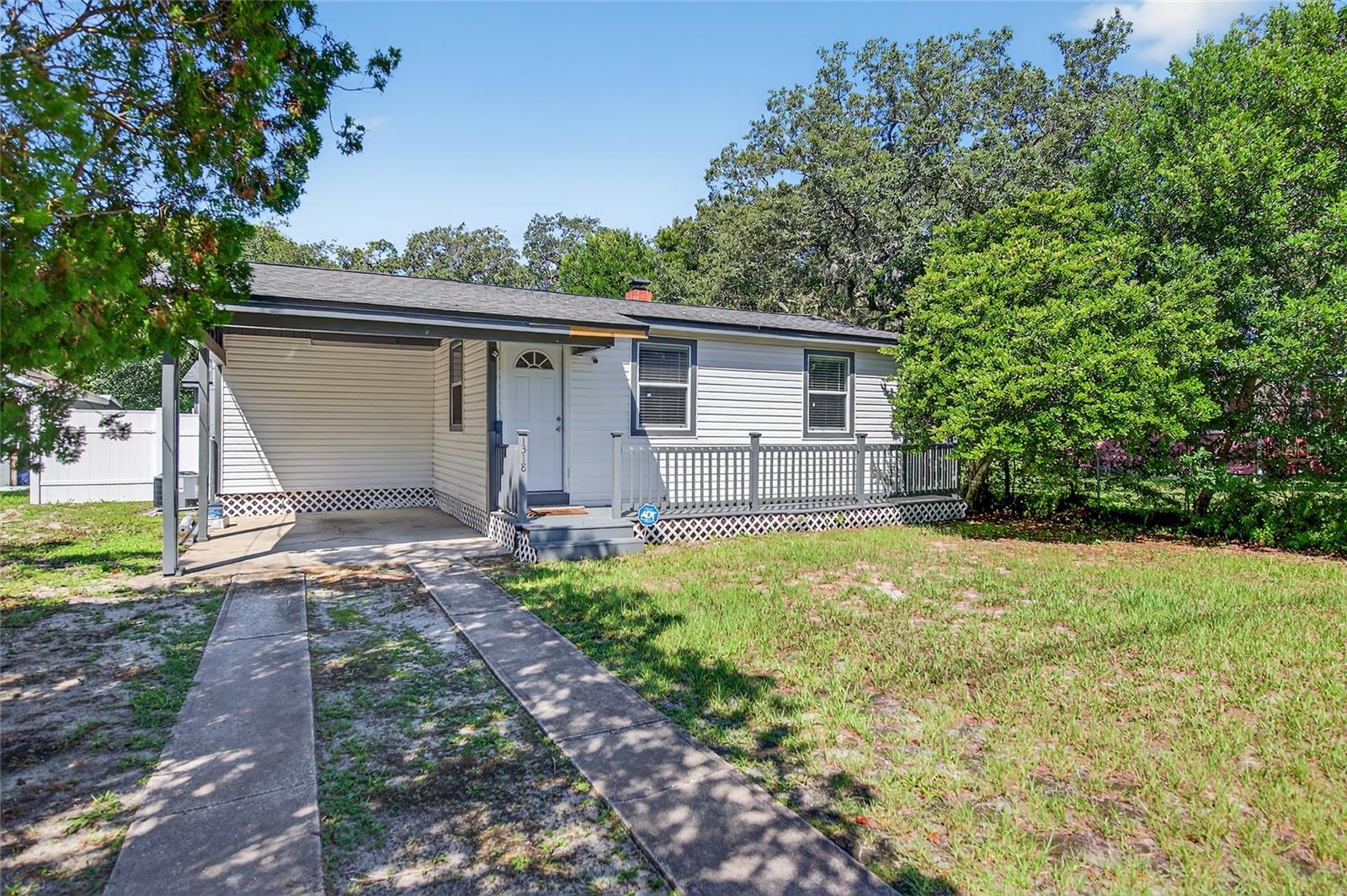 Welcome to your charming retreat in Daytona Beach! This updated bungalow with inlaw suite blends modern comfort with classic Florida charm. Located just minutes to the beach, Tanger outlets and I-95. Ideal for full time living, a vacation home, or investment with rental income. Inside you'll find a bright open layout with updated flooring, neutral paint, and a renovated kitchen featuring granite countertops, modern cabinetry, and stainless steel appliances. The main home offers 2 bedrooms, 2 full baths and a bonus room with contemporary finishes. The bonus room is perfect for a sunroom or private den. A major highlight is the stand alone ADU studio apartment with a private entrance, full kitchen and bath, open concept living/sleeping area-ideal for guests, a home office or rental income. The fenced backyard is perfect for pets, grilling, and enjoying the Florida lifestyle.