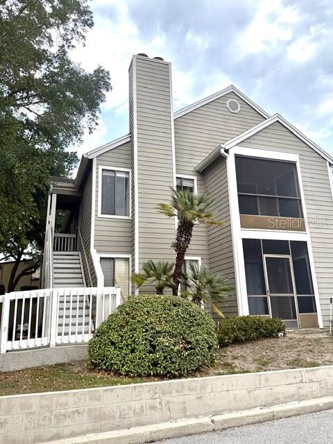 Spacious 2BR/2BA upstairs condo unit with a balcony.  Great Room with a fireplace, tile flooring in the kitchen and Great Room, and Baths.  Split bedroom plan. Primary bedroom has walk in closet, and primary bath with a shower.  Guest bathroom has a tub/shower combination. Inside laundry area with full size washer & dryer. Lots of cabinets in the kitchen. Relax on the balcony.  Lots of natural lighting. Community pool and tennis court.  Convenient location to shopping, restaurants, and major roadways.