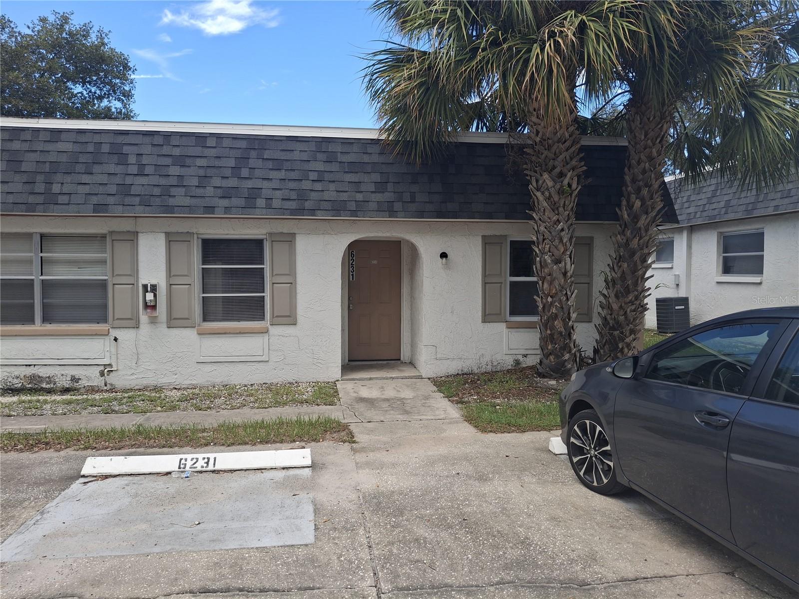 (aka 6231 HARRISON STREET, NEW PORT RICHEY, FL 34653) "Discover your private oasis nestled in the heart of New Port Richey, FL! This 2-bedroom, 1-bathroom home features spacious living areas with attractive flooring throughout. The elegant bathroom provides a relaxing retreat after a long day. Step outside to your private patio, perfect for starting your day with a peaceful cup of coffee. Conveniently located near the vibrant downtown area, you'll have easy access to live theater, trendy restaurants, unique gift shops, and a bustling nightlife. Outdoor enthusiasts will find plenty of opportunities for biking and canoeing along the Cotte River, as well as enjoying parks and music festivals. Additionally, golfers and beach lovers will appreciate the proximity to golf courses and stunning beaches. Trash and lawn maintenance are included for added convenience."