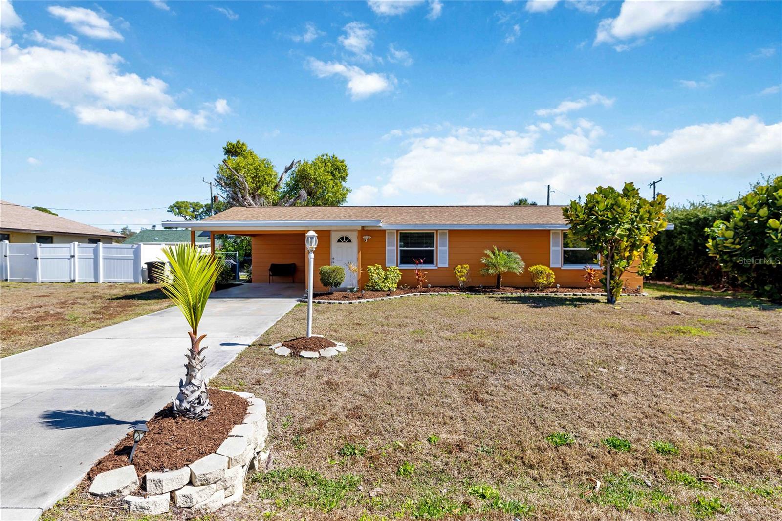 Welcome to 3035 Shamrock Dr, Venice, FL 34293, a solid block-constructed 3-bedroom, 2-bath home set on just under a quarter acre, offering space, privacy, and an unbeatable Venice location. Inside, you’ll find large tile flooring throughout, creating a clean, cohesive look and easy maintenance, while the kitchen features granite countertops, stainless steel appliances, and ample cabinetry for everyday functionality and entertaining. The split-bedroom layout provides comfort and flexibility, and an outdoor shower adds a practical touch for rinsing off after beach days or yard projects. Major improvements include impact-resistant windows and doors (2024), clothes washer & dryer (2024), AC (2025), roof (2020), electric panel (2021) and a water heater (2026), providing peace of mind and insurance-friendly features. Step outside to a fully fenced backyard with a storage shed and nearly quarter-acre footprint, offering privacy and endless potential — an ideal blank canvas for your future outdoor oasis with plenty of room to add a pool, spa, garden, or expanded entertaining space. Located in Flood Zone X with no HOA or CDD fees, this property offers flexibility, cost savings, and everyday ease of ownership. Enjoy being just 1 mile to Shamrock Park & Nature Center, featuring walking trails, tennis courts, playgrounds, and access to the Legacy Trail, and only 3 miles to historic Downtown Venice Island, where boutique shopping, waterfront dining, farmers markets, and Gulf Coast beaches create the lifestyle buyers dream about. Whether you’re seeking a full-time residence, seasonal retreat, or investment opportunity, this home combines location, updates, and outdoor potential in one of Venice’s most desirable areas. Schedule your private showing today and discover the lifestyle waiting for you.