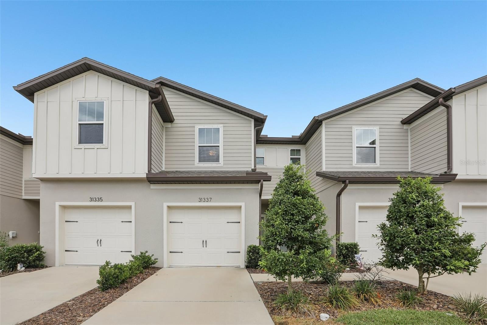 Welcome to this beautifully maintained 2-bedroom, 2.5 bath townhome nestled in the highly desirable Chapel Crossing community. Designed for comfortable, low-maintenance living, this inviting home features an open and functional floor plan filled with abundant natural light. The spacious kitchen boasts ample cabinetry, large countertops with plenty of prep space, and overlooks the main living area, making it perfect for everyday living and entertaining. The bright and airy living and dining spaces flow seamlessly through sliding glass doors to a private outdoor patio—an ideal spot to enjoy your morning coffee, unwind after a long day, or entertain family and friends. Upstairs, you'll find two generously sized bedrooms and 2 adjoining well-appointed full baths, while the convenient half bath on the main level is perfect for guests. Whether you're a first-time homebuyer, looking to downsize, or searching for an excellent investment opportunity, this home checks all the boxes. Residents of Chapel Crossing enjoy exceptional community amenities, including a beautiful clubhouse, fully equipped fitness center, resort-style community pool, park, and playground. Conveniently located near shopping, dining, schools, and major roadways, this townhome offers the perfect combination of comfort, convenience, and an active lifestyle. Don't miss the opportunity to make this wonderful home yours!