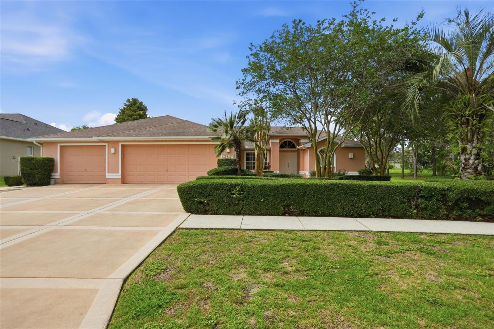 Welcome to one of the most desirable homes in Pristine Place! Perfectly positioned on a highly coveted lot with no rear neighbors and no neighbors to the right, this beautifully maintained 3-bedroom, 2-bathroom, 3-car garage, pool home offers privacy, space, and endless upgrades! Step inside to discover tile flooring throughout, soaring cathedral ceilings, plantation shutters throughout the home, a spacious living room, large family room, and an oversized formal dining room designed for both everyday living and entertaining. The kitchen is clean, bright, and ready for its next chef, featuring a breakfast bar, brand-new stove, and brand-new microwave. The split-bedroom floor plan offers generously sized bedrooms with ample closet space, while multiple sets of sliding glass doors provide stunning pool views from nearly every room in the home. Step outside to your private backyard retreat featuring a sparkling pool surrounded by brick pavers, a convenient outdoor pass-through drink bar, and beautifully manicured landscaping. Need extra storage? The oversized laundry room offers abundant cabinetry and workspace and the pool area features a nice large pool closet for all your pool toys. The deep third-car garage is large enough to accommodate a boat on a trailer, making it perfect for outdoor enthusiasts. Additional upgrades and features include: New roof to be installed, New AC, New pool pump, New water heater, Fresh interior paint, Freshly manicured landscaping, Irrigation system on well water, Not located in a flood zone, Sinkhole repaired and fully remediated! This exceptional property combines privacy, functionality, and peace of mind in one of Spring Hill's most sought-after gated communities. Schedule your private showing today!