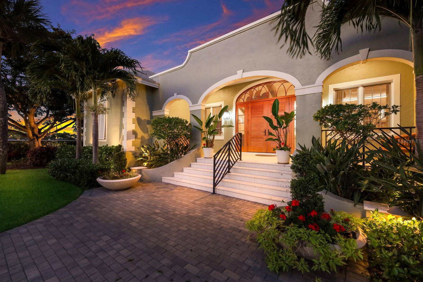 Indulge in the epitome of luxury living with this exceptional residence nestled in Boca Grande's esteemed historic district. Meticulously renovated from top to bottom between 2019 and 2020, this home has been reinvented with incredible attention to detail, and offers a seamless blend of elegance and functionality.

Step through the custom metal front gate adorned with charming seahorses, and be greeted by a lushly landscaped private yard, ensuring both security and serenity within its walled and fenced confines. Beyond the grand mahogany doors lies a magnificent great room boasting vaulted ceilings, adorned with expertly crafted wood finishes and beams. A gas fireplace, complemented by a one-of-a-kind fossilized granite marvel from Italy, serves as the centerpiece, exuding warmth, and sophistication.

Every aspect of this home has been thoughtfully designed to cater to your needs, from the intricately trayed ceilings in each bedroom to the ensuite bathrooms featuring spacious showers equipped with carefully positioned grab bars for enhanced safety. The master bedroom provides a serene haven with its poolside vista and custom headboard, complete with integrated switches for seamless control of lighting and fans.

The heart of the home resides in the gourmet kitchen, showcasing exquisite wood cabinetry, quartz countertops, high-end appliances including a Wolf induction range, and a dedicated ice maker, perfect for culinary enthusiasts. Seamlessly flowing into the breakfast area and opening onto the pool deck, this space invites gatherings and relaxation alike. Additional features include impact glass windows and doors, a tankless hot water heater, home generator, and a multi-zone Sonos sound system, ensuring a harmonious blend of comfort and security.

Designed with accessibility in mind, this home boasts widened hallways and doorways, zero-threshold showers, and exterior ramps facilitating effortless mobility. Embrace the coveted lifestyle of Boca Grande with multiple beach access points just a leisurely stroll away. Prepare to elevate your living experience in this exceptional home, where unmatched craftsmanship converges with effortless accessibility amidst the timeless charm of Boca Grande's historic ambiance.