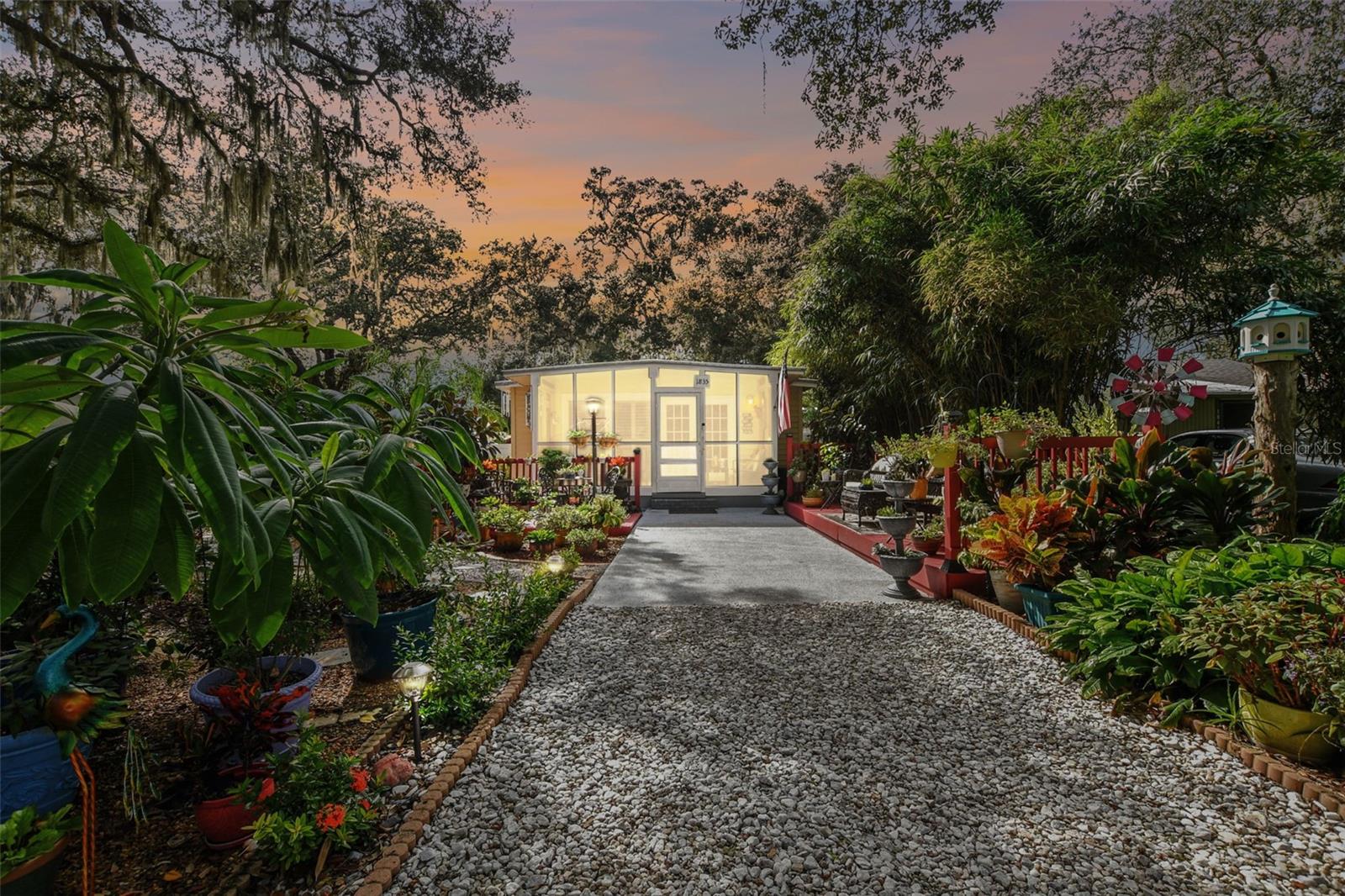 Escape to your serene lakeside oasis in Odessa! Welcome to Holiday Club, an exclusive gated lake community nestled amidst a lush canopy of trees. While not directly on the lake, it's just steps away, offering effortless access to water activities and community amenities on foot, bike, or a quick ride. This enchanting 2-bedroom, 1-bath bungalow boasts 704 sqft of inviting living space. Revel in the elegance of Cambia Quartz countertops and stainless steel appliances in the kitchen. Outside, unwind by the above-ground pool in a meticulously landscaped yard, ideal for entertaining or escaping the hustle and bustle of daily life. A convenient shed provides extra storage and laundry facilities. Holiday Club is a haven for recreational enthusiasts, featuring a park with a private beach, dock, sand volleyball court, picnic area, playground, and basketball courts. Situated in a top-rated school district, it's also conveniently close to medical centers, shopping, restaurants, schools, libraries, highways, downtown Tampa, amusement parks, and more. The community's remarkable stability reflects the profound contentment of its residents, who savor the exceptional Florida lifestyle it offers. This home embodies comfortable living, seamlessly blending style and convenience in a one-of-a-kind lakeside setting. Don't miss the chance to transform it into your dream lakehouse. Most of the plants & the outside decor are included & stay with the home. Schedule your appointment today!