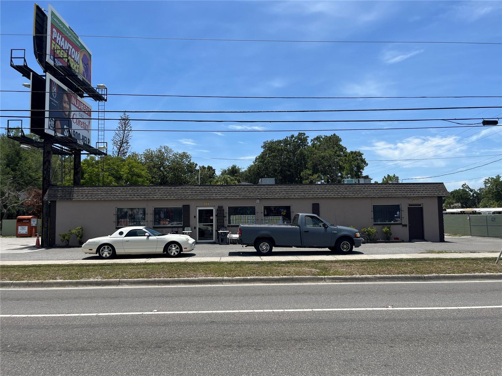 Attention small business owners and investors, unique multiple cashflow opportunity. Prime high-traffic retail location on E Michigan Street.  Corner .56-acre lot includes the main building which has 2 standard garage doors, 2 bathrooms and 4 additional entrances. Can be divided or maintained as the open thrift outlet but would be easily adapted to most commercial activities. The 2 single family residences included in the purchase can be torn down and re-zoned to 2 homesites, with 50 ft x140 ft lots, and potential new zoning may allow for heights soaring 2 or 3 stories. The properties are at the back entrance to Blankner K-8 School and an easy walk to Boone High. Stacked billboards are included in this commercial product offering multiple potential sources of income. The retail space has ample parking and has served as a hub for generations. The combination of great location with multiple-sourced income potential offers a special opportunity that will not last long. Contact us today to schedule a visit.