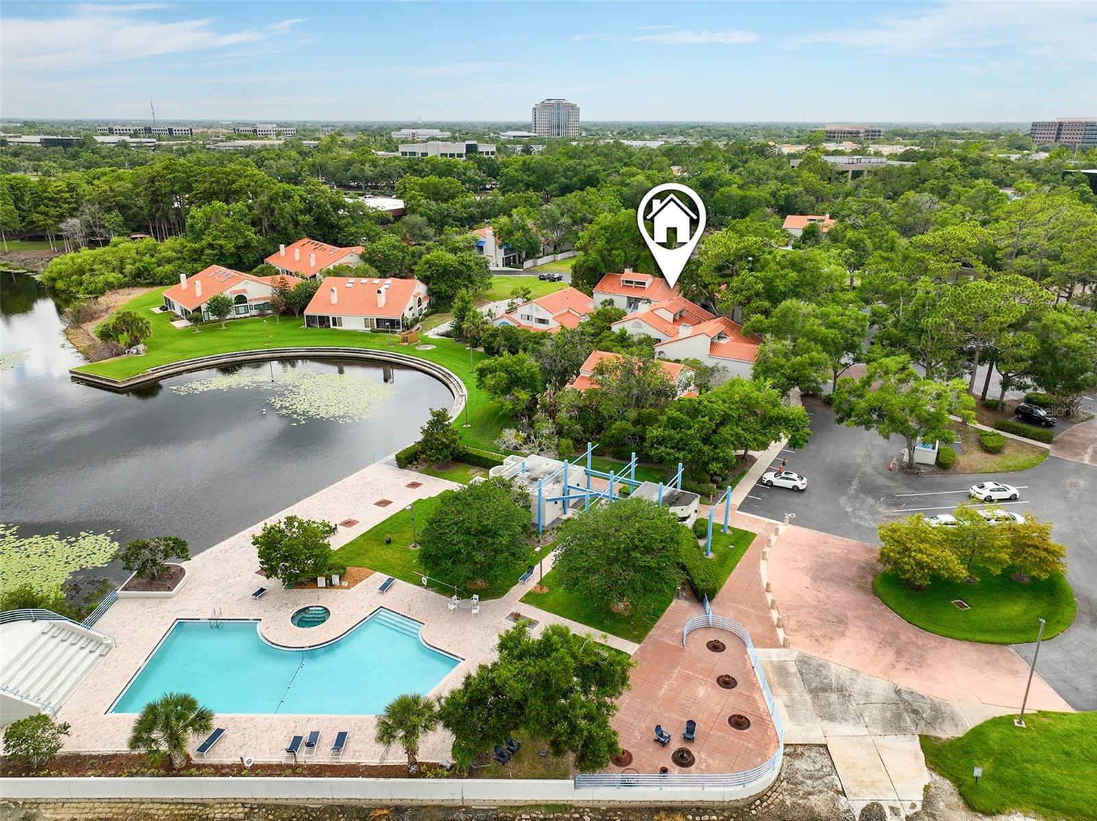 Updated GROUND-FLOOR condo in the secluded gated community of Sun Bay Club in Maitland, Florida overlooking Lake Destiny. Many units sit on lake fed ponds with fountains which offer a tranquil and peaceful atmosphere. Enjoy Florida life with a tennis court, a beautiful LAKE FRONT POOL, and LAKE ACCESS for residents to use boats and jet skis. The open-concept layout makes this 2 bedroom/2 bath condo feel so spacious. The LARGE KITCHEN (renovated 2023) features white kitchen cabinets, quartz countertops, a newer microwave (2024), and a 2025 dishwasher. Wood-look tile flooring flows through living areas connected to wood flooring throughout - no carpet! Extended sliding glass doors open to an ENCLOSED SUNROOM with windows and a peaceful pond view. Use it as a home office, reading room, or morning coffee retreat. Additionally, each bedroom has it's own screened in patio! The primary suite features double entry doors, access to both the enclosed sunroom and it’s own screened patio. It’s also equipped with a WALK-IN CLOSET with built-in shelving and an UPDATED 2026 ENSUITE BATHROOM with a new double sink vanity, modern mirrors, lighting, and a pocket door providing privacy to the shower and water closet room. The second bedroom offers DOUBLE CLOSETS with built-in shelving as well. HALLWAY BATHROOM UPDATED in 2026 with new vanity, mirror and lighting. HOA INCLUDES internet/cable and takes care of everything exterior including roof. Minutes from Maitland and Winter Park shopping, dining, and just a few minutes drive to highway I-4. Schedule a viewing today!
