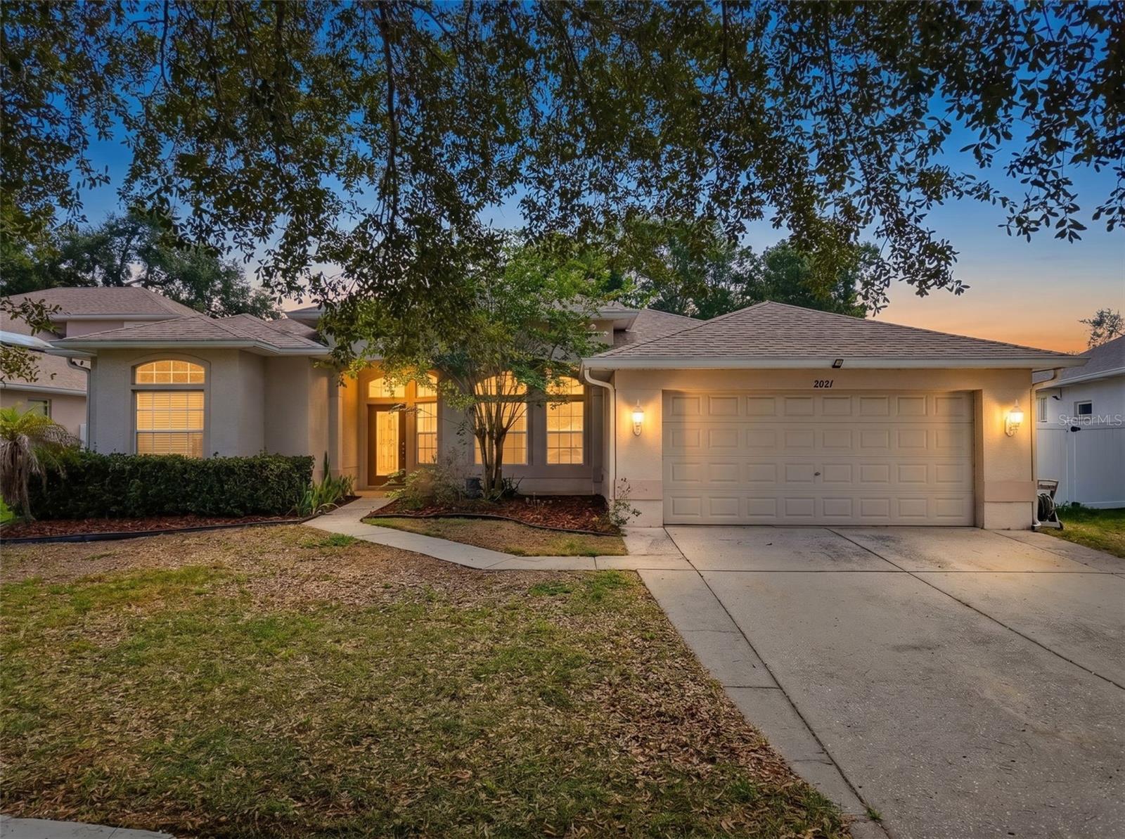 Welcome home to this spacious, neat and clean 4/3/2 designed for comfortable everyday living. Inside, you’ll find a versatile layout featuring a formal living room, dining area, cozy breakfast nook, and a separate family room, offering plenty of space to gather, relax, entertain or even multi-generational living. The home features tile flooring throughout the main living areas and LVP flooring in the bedrooms for a clean, cohesive feel and easy upkeep. The functional layout provides both open and defined spaces for daily living. Primary ensuite has double walk-in closets, a garden tub, double sinks, and a separate shower. Step outside to a screened lanai and additional patio area - perfect for relaxing or enjoying the outdoors - overlooking a fenced backyard with added privacy and room to make it your own. Roof permit from 2023. Tankless water heater. Call today before it's too late! This property has a repaired sinkhole, reports available.