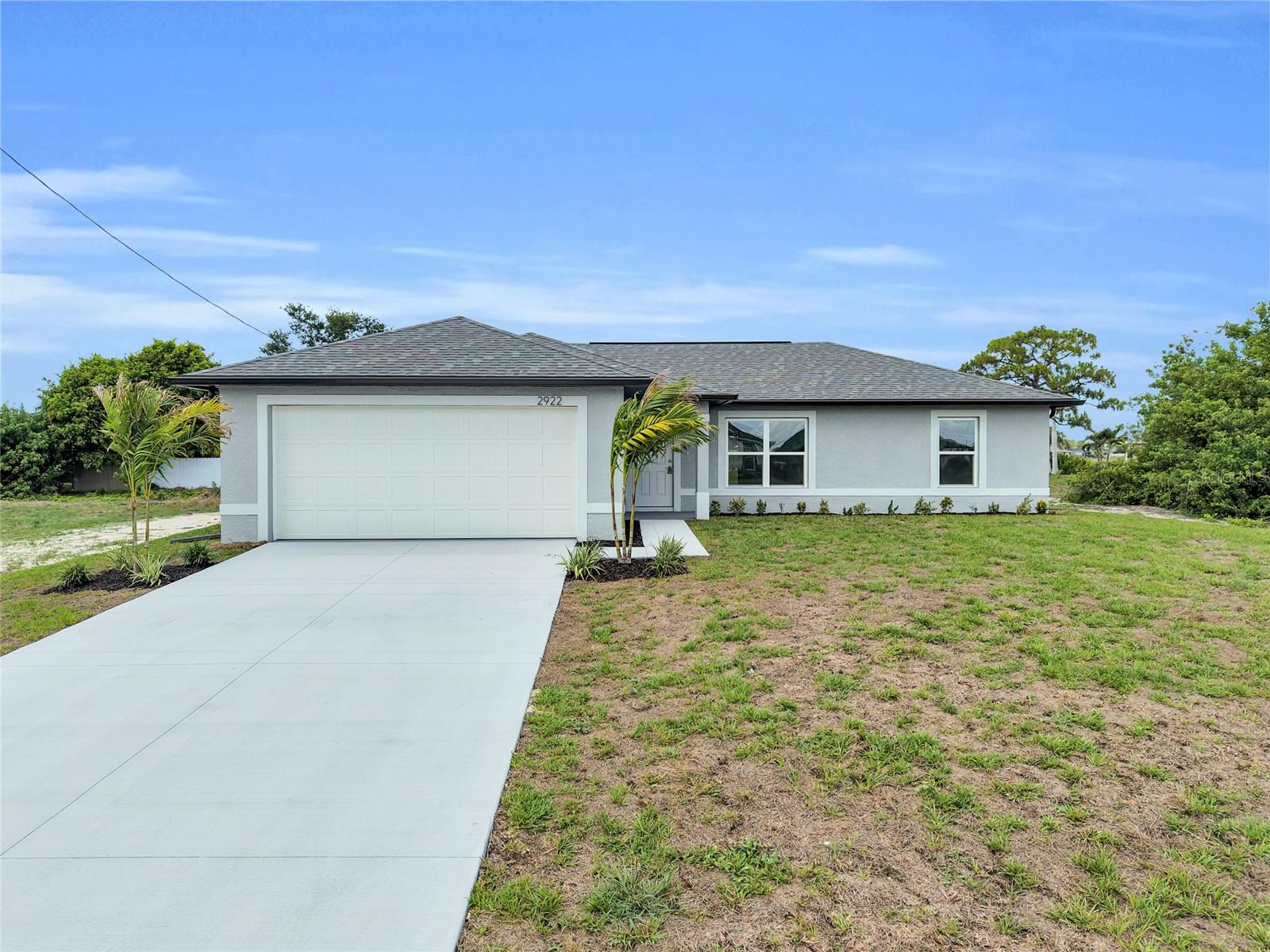 Under Construction. Brand new construction in desirable NE Cape Coral! This beautiful 3-bedroom, 2-bath home offers anopen-concept design with durable porcelain tile flooring throughout, stone countertops, stainlesssteel appliances, and contemporary finishes. The spacious primary suite features dual closets, dualsinks, and a fully tiled walk-in shower. A covered lanai provides the perfect space to enjoyFlorida's outdoor lifestyle.Conveniently located near Lake Kennedy Community Park, Diplomat Elementary School, Island CoastHigh School, shopping, dining, and local favorites such as Hurricane Grill & Wings. Enjoy easyaccess to Del Prado Blvd, Pine Island Road, US-41, public boat ramps, parks, restaurants, and otherarea amenities.No HOA and located outside of a flood zone. Home includes a 1-year builder warranty and a 2-10 Home