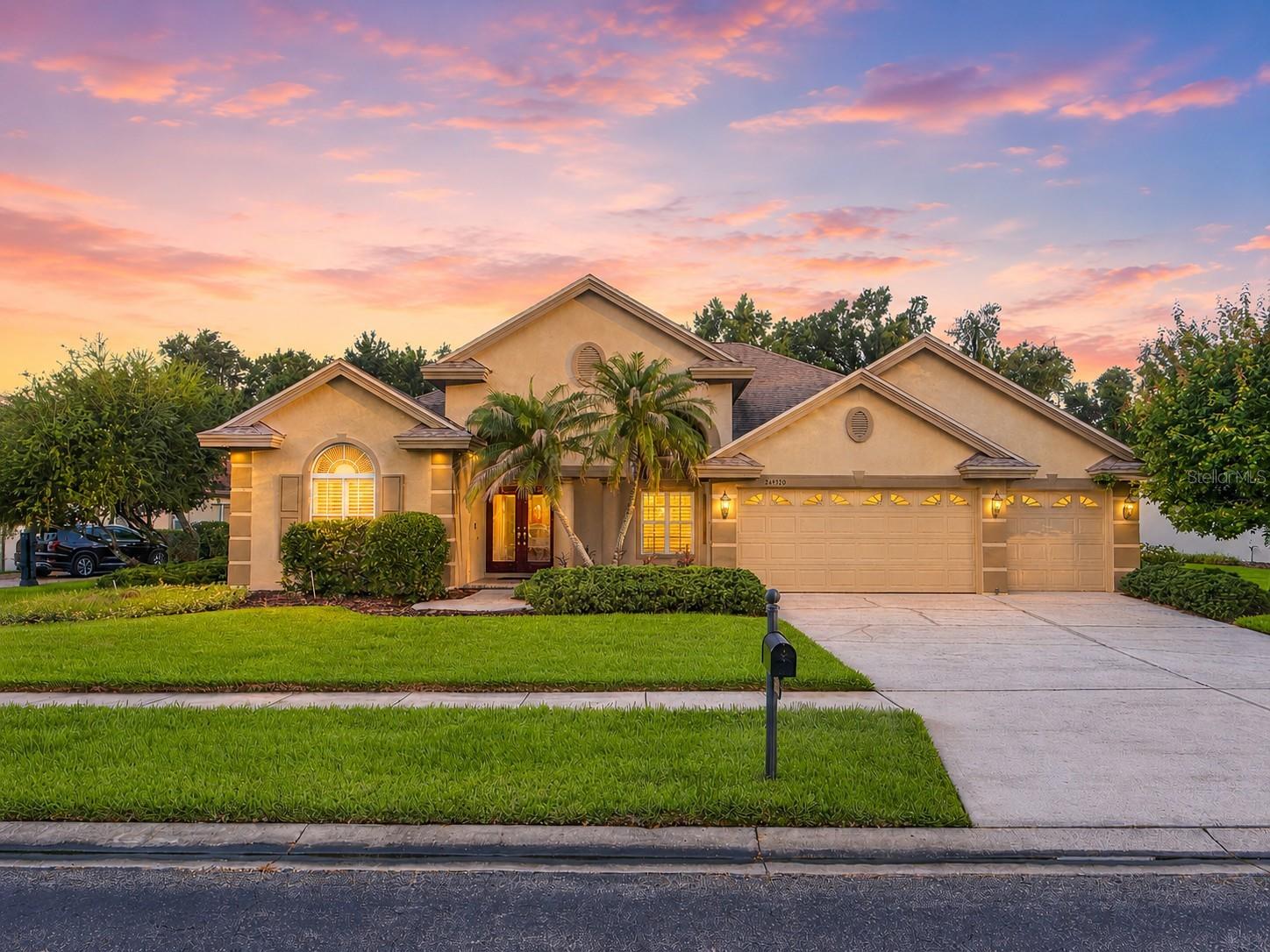 Virtually Staged. A Peaceful Retreat in the Heart of Seven Oaks

Welcome home to this beautifully maintained 4-bedroom, 3-bathroom, 3-car garage pool home offering 2,676 square feet of thoughtfully designed living space where comfort, elegance, and peace of mind come together. From the inviting curb appeal and light-filled interior to the luxury vinyl plank flooring, plantation shutters, and split-bedroom floor plan, every detail has been carefully considered.

The updated kitchen features solid wood cabinetry, granite countertops, stainless steel appliances, double pantries, under-cabinet lighting, Insta-Hot water, a touchless faucet, and a built-in water purification system. The spacious primary suite offers lanai access, dual walk-in closets, and a spa-like ensuite, while the family room with surround sound and expansive sliding doors seamlessly connects to your outdoor retreat.

Step outside and discover your own private oasis. The screened lanai showcases a heated saltwater pool surrounded by lush landscaping, creating the perfect setting for relaxation or entertaining. The custom outdoor kitchen features a built-in gas grill, hood, side burner, under-counter lighting, Bluetooth speakers, and customizable LED lighting for unforgettable evenings. The pool is pre-cored for a safety fence (included), and the fenced backyard also features a dedicated dog run with a built-in doggie door—because every member of the family deserves to feel at home.

Additional highlights include a bright conservatory, an upgraded three-car garage, and major updates already completed, including the roof (2022), pool pump (2024), water softener (2019), and water heater (2019)—making this home truly move-in ready.

Seven Oaks is more than a neighborhood—it's a lifestyle. Residents enjoy an incredible array of resort-style amenities, including a clubhouse with a café, state-of-the-art fitness center, theater, Olympic lap pool with waterslide, resort pool, splash pad, poolside cabanas, tennis, pickleball, basketball, volleyball, playgrounds, and scenic nature trails throughout the community. Zoned for highly rated Seven Oaks Elementary School, located within the community, and just minutes from I-75, hospitals, shopping, dining, and everyday conveniences, you'll enjoy the perfect balance of tranquility and accessibility.

This is more than a home—it's the lifestyle you've been waiting for. Schedule your private showing today!