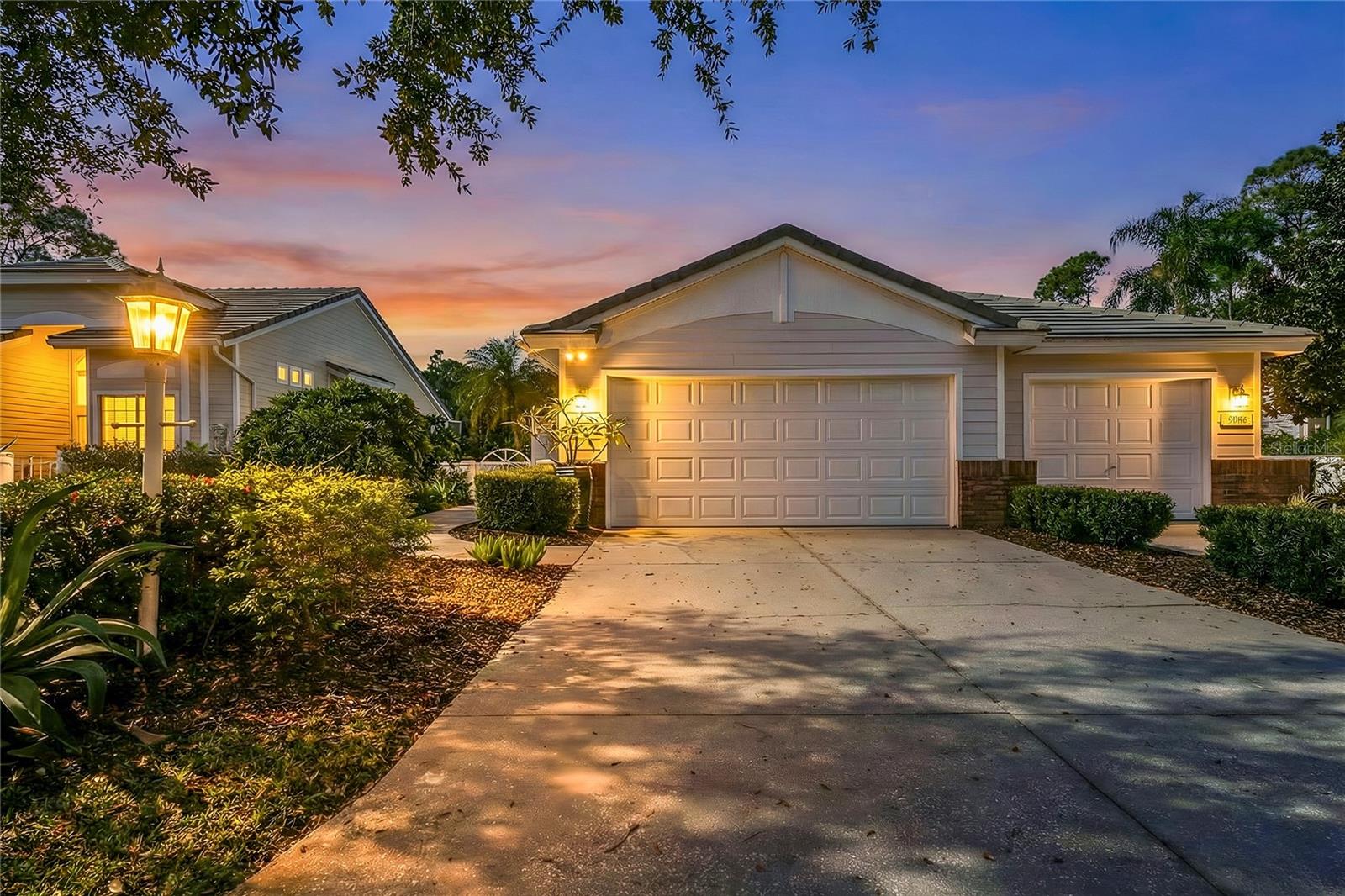 WOW...NEW LIST PRICE! When Only the Best Will Do! This exceptional villa-style home, has been completely renovated from floor to ceiling with top-of-the-line, high-end finishes throughout. Offering 2 bedrooms and 2 full baths, this home features an open and airy living and dining floor plan designed for both everyday comfort and elegant entertaining.

The chef’s kitchen is a true showpiece, thoughtfully redesigned with locally crafted custom wood cabinetry, Kitchen Craft pull-outs, soft-close doors and drawers, under- and over-cabinet accent lighting, a coffee nook, convenient drop-off counter, farmhouse sink, and thick quartz countertops. High-end stainless steel appliances and a built-in quartz table create the perfect space for casual breakfasts or effortless dinners—delivering a true culinary experience.

Designer lighting and fans, solid pocket doors, soaring ceilings, updated LED lighting, and additional electrical outlets added during renovation elevate both form and function. Luxury vinyl flooring flows through the main living areas, complemented by new base molding and fully customized closets throughout. Major updates include a 2020 roof and a 2025 tankless hot water heater.

The primary suite is a private retreat, featuring a spa-inspired ensuite with an oversized seamless shower, custom cabinetry, dual sinks, 8-foot porcelain tile, comfort-height commode, and a dream-worthy custom walk-in closet.

Enjoy peaceful outdoor living in the newly added screened lanai extension, overlooking a serene preserve backdrop. Completing the property is a beautifully maintained courtyard, 2-car detached garage with additional storage, conveying with the home. This is a rare opportunity to own a truly re-designed villa where luxury, quality, and thoughtful design come together beautifully! Whitebridge Court is a sought-after neighborhood within University Park Country Club, celebrated for its maintenance-free lifestyle, community pool, and proximity to the Club’s amenities. University Park Country Club is consistently ranked one of the top courses in Florida featuring 27 holes of championship golf, tennis and pickleball, fitness center, croquet – as well as an array of social and group activities. Just a short drive outside this peaceful enclave is downtown Sarasota, with shopping, arts & theatres, museums, dining and entertainment, top-ranked healthcare, award winning beaches and SRQ International Airport. You will enjoy the resort style club amenities with the required Social membership at UPCC, which is owned by the residents through a Recreation District.