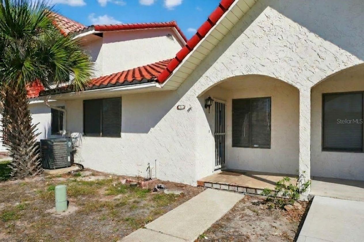 Welcome to low-maintenance living in the heart of Port Orange! This charming single-story town home in the
desirable Town homes West community offers a perfect blend of comfort and convenience. The functional
floor plan features a spacious living and dining area with cathedral ceilings that flows seamlessly through
sliding glass doors to a large, Screened-in rear patio—ideal for enjoying the Florida breeze. Both bedrooms
serve as private retreats have access to separate bathrooms. Residents enjoy access to a sparkling community
pool and cabana. Perfectly situated just minutes from top-rated schools, the Pavilion at Port Orange, and local
beaches, this home is an exceptional opportunity for first-time buyers or savvy investors.
